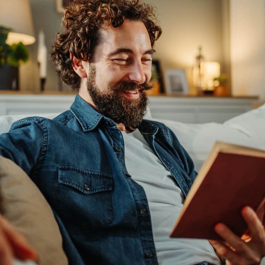 genius man who appreciates silence reading at home