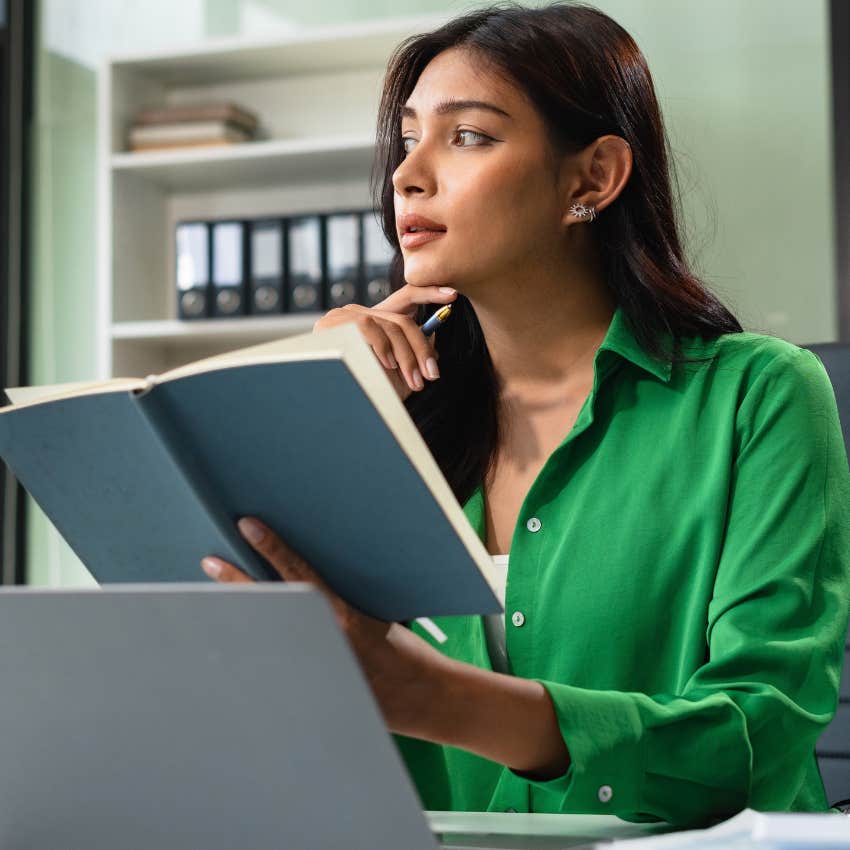 intelligent woman reading a book connecting abstract ideas and noticing patterns
