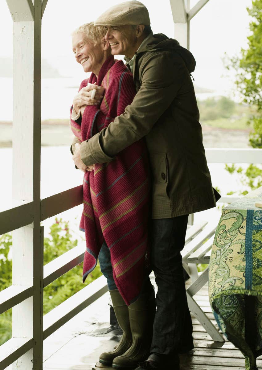 older couple relaxing on the porch together