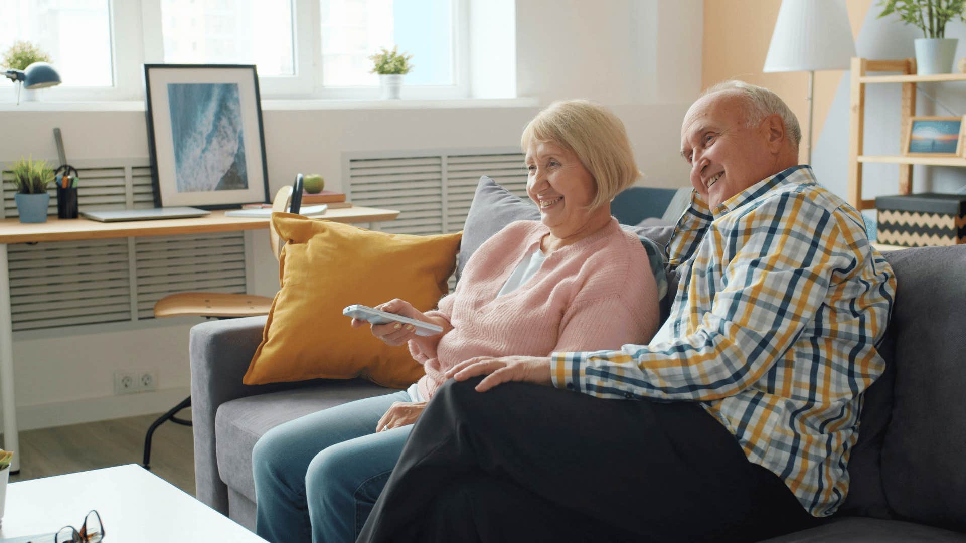 older couple revisiting animated films as habit to feel younger