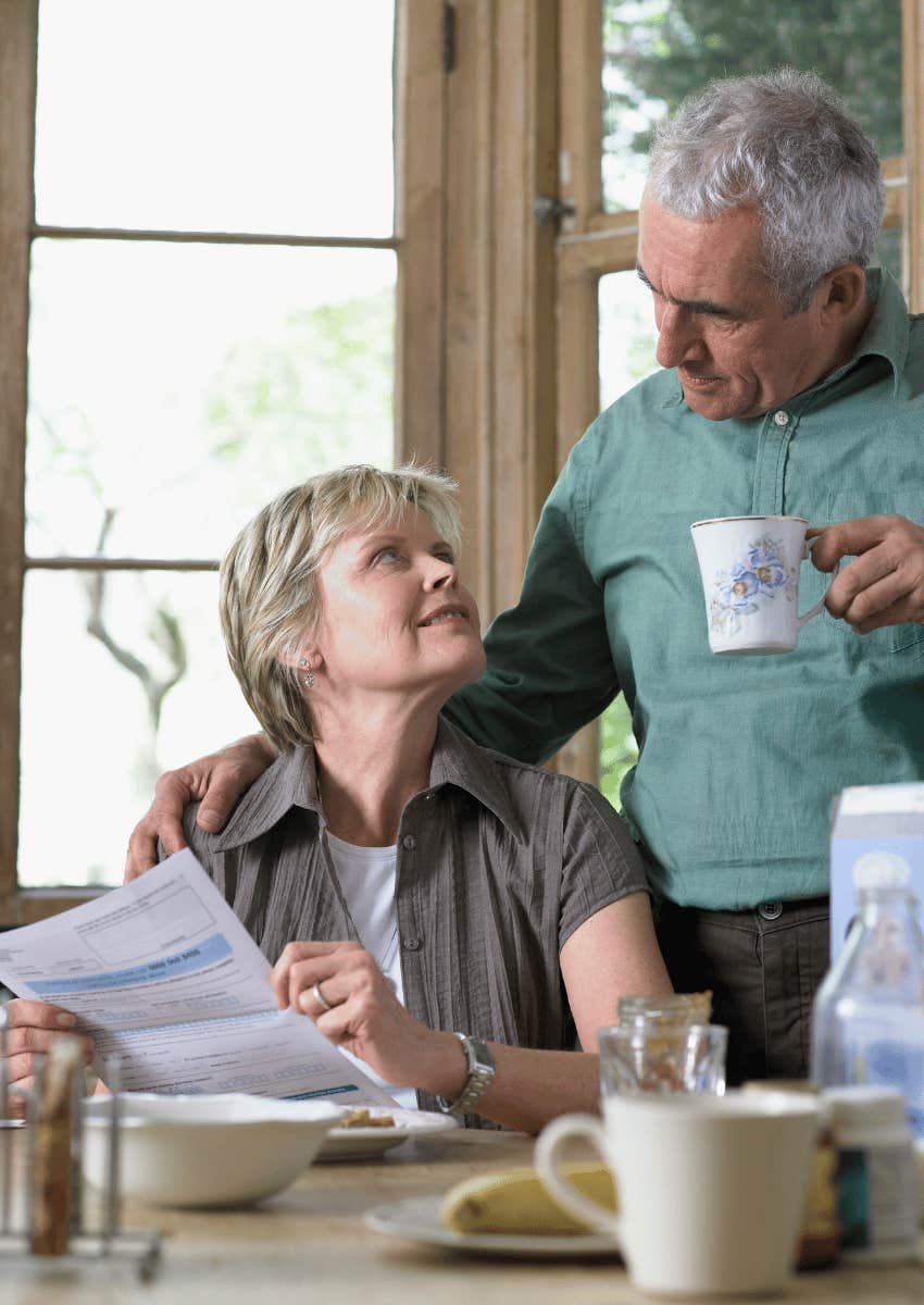 older couple talking in the kitchen
