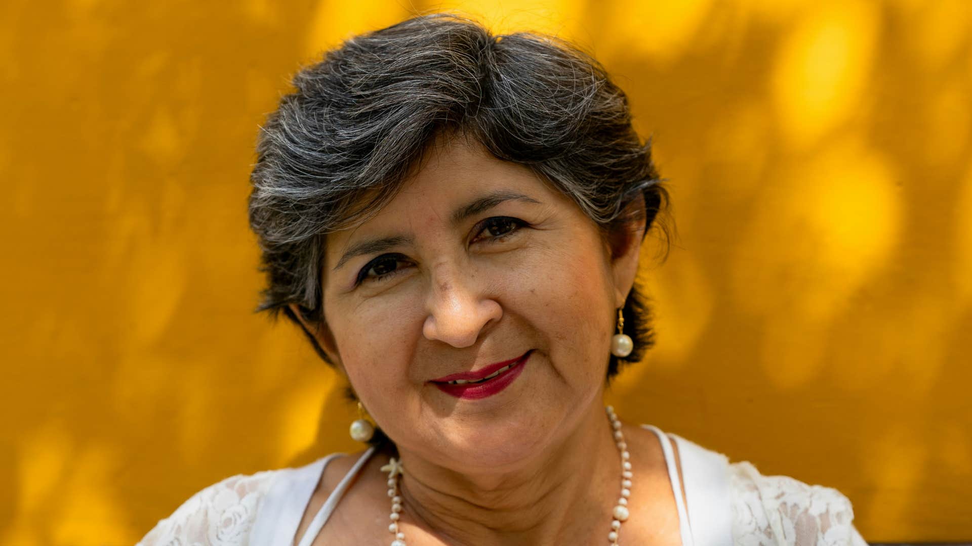 confident older woman showing she defines herself