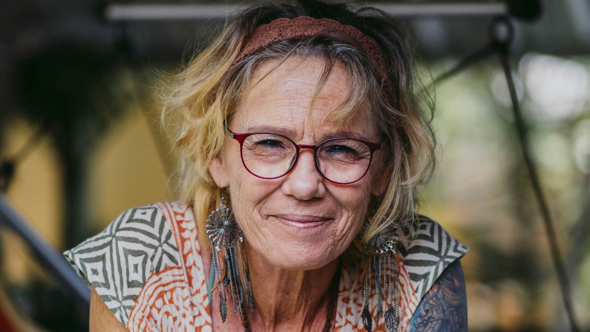 smart older woman leans in showing freedom