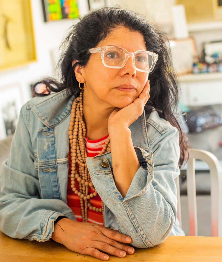 Gracefully aging woman sits confidently