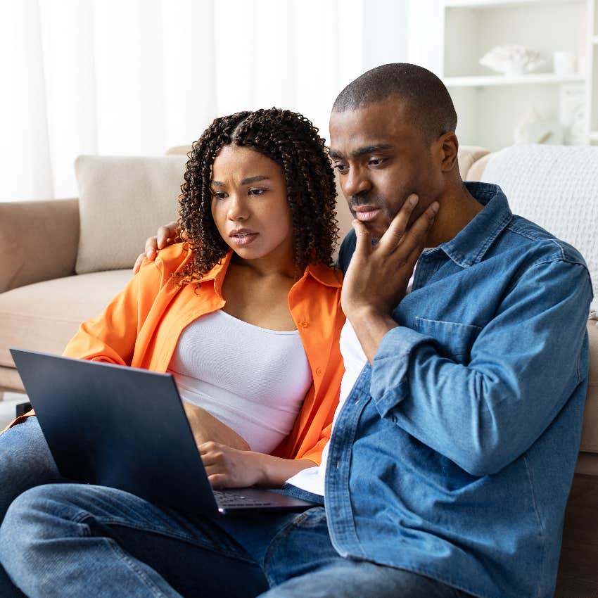 newlywed couple reading comments online after posting invoice no-show guests