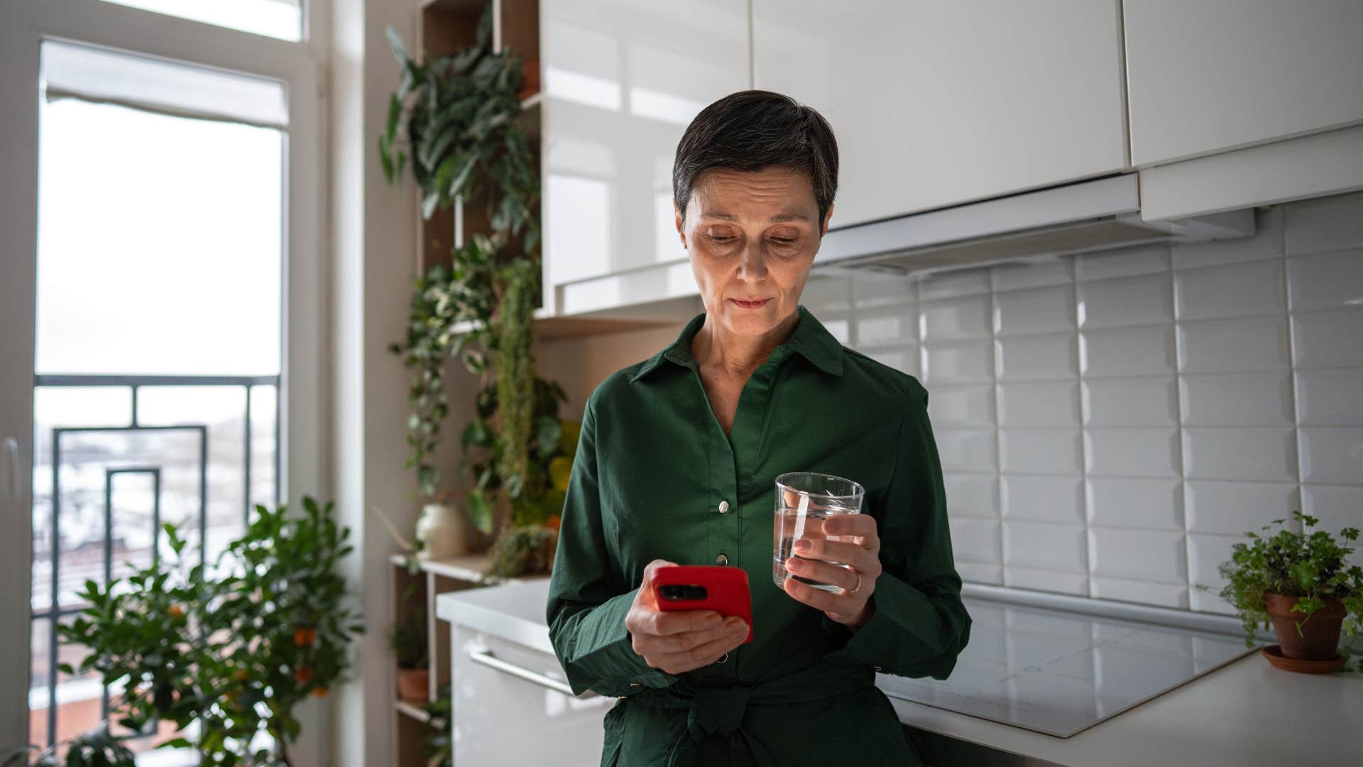 sad modern mom comparing herself to others online