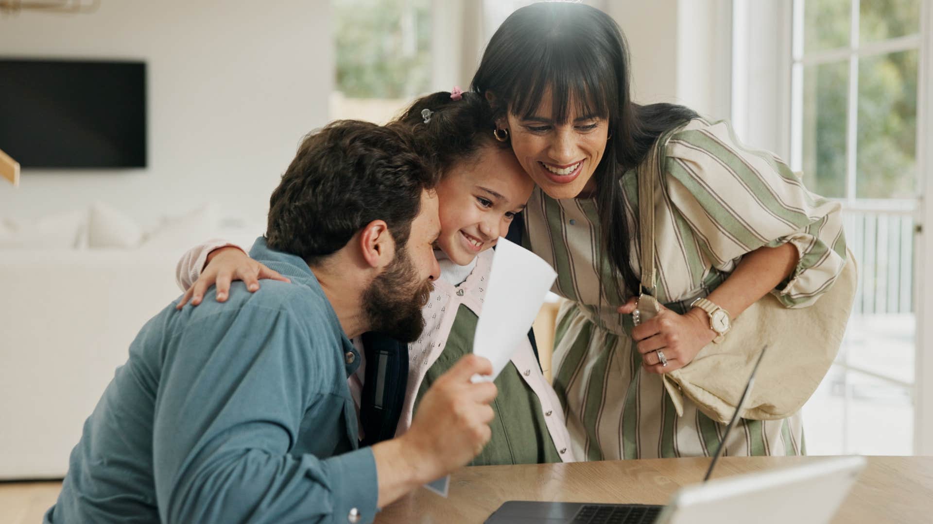 parents rewarding every little achievement for their daughter