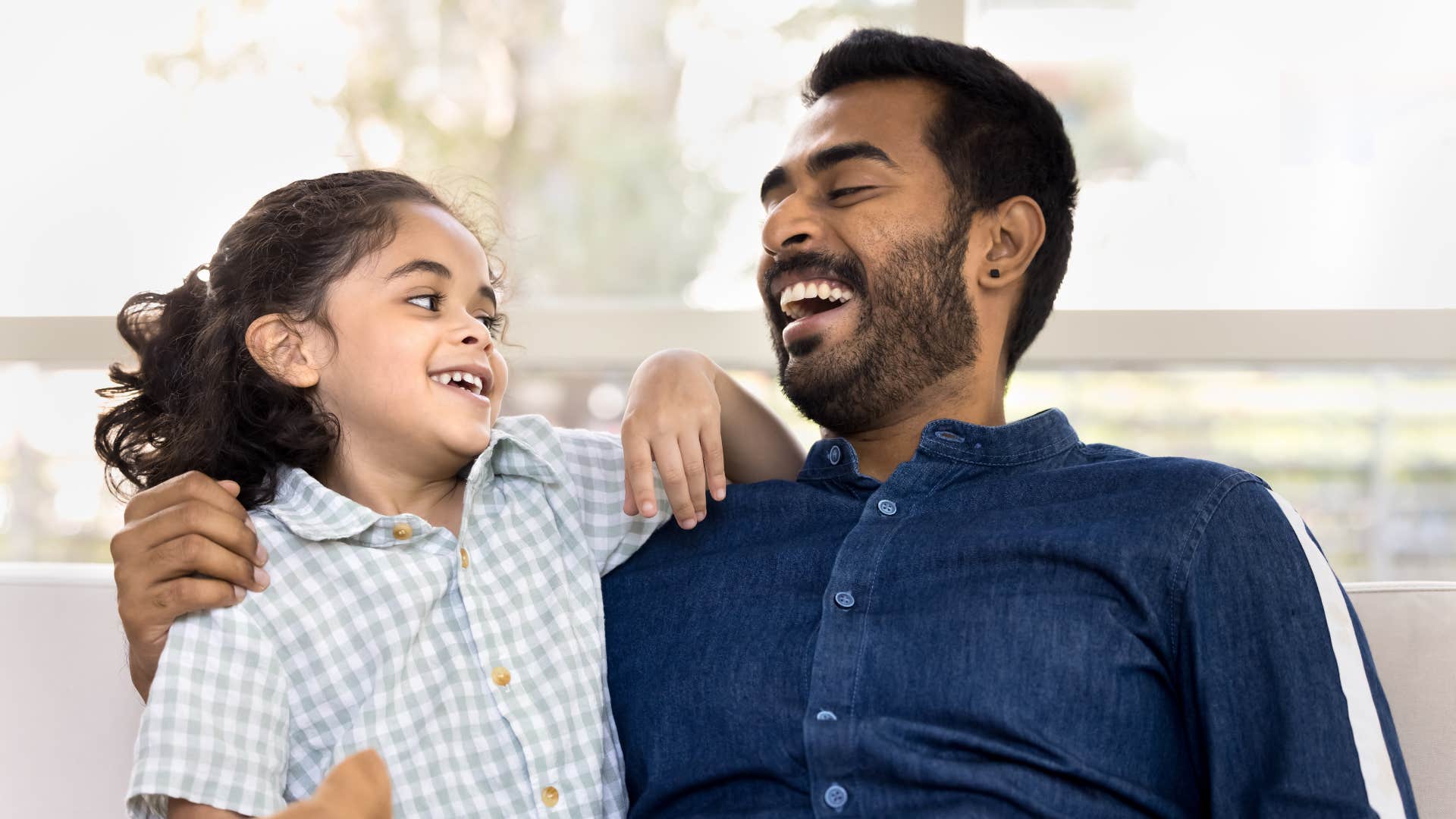 happy kid and parent communicate