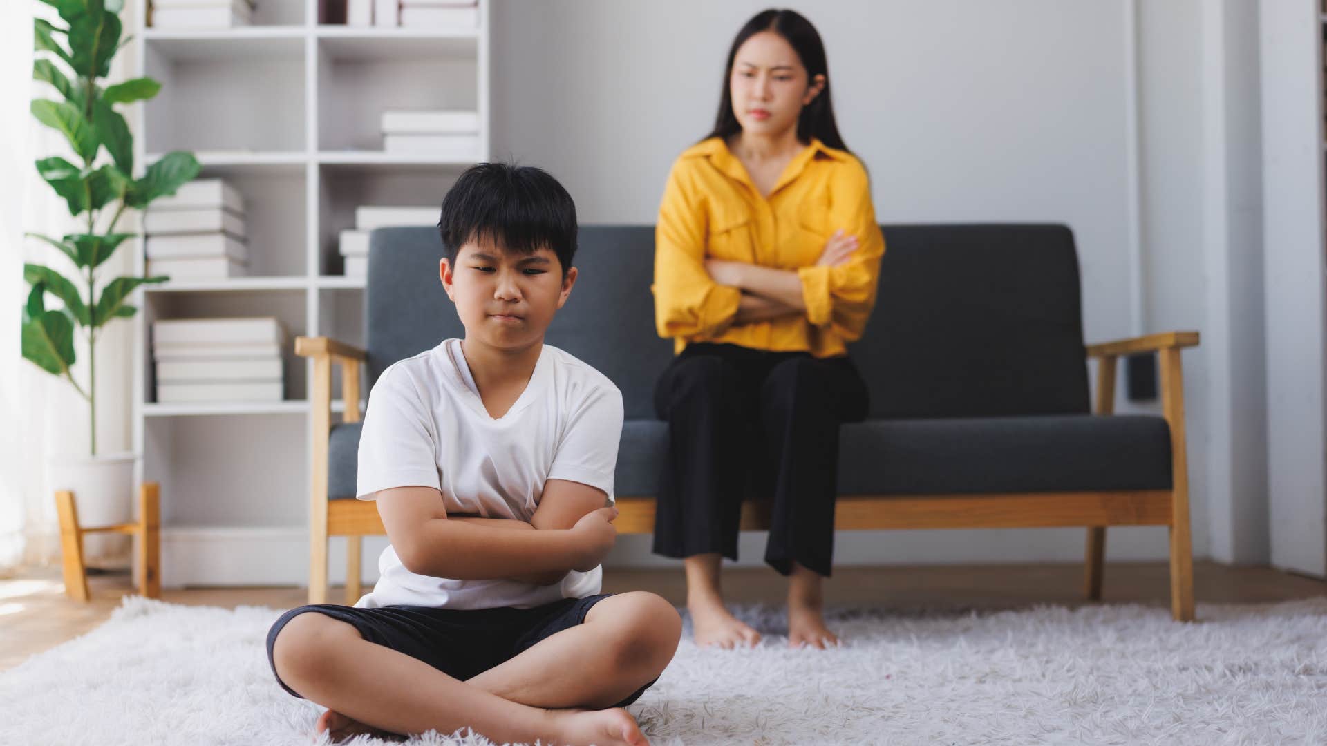 upset child and parent showing taught perspective