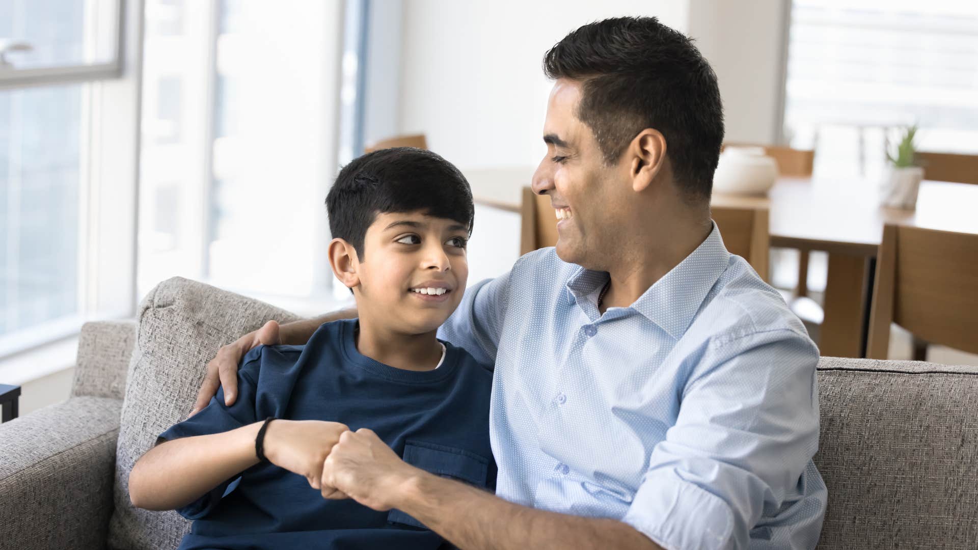 parent and kid fist bump showing reliability