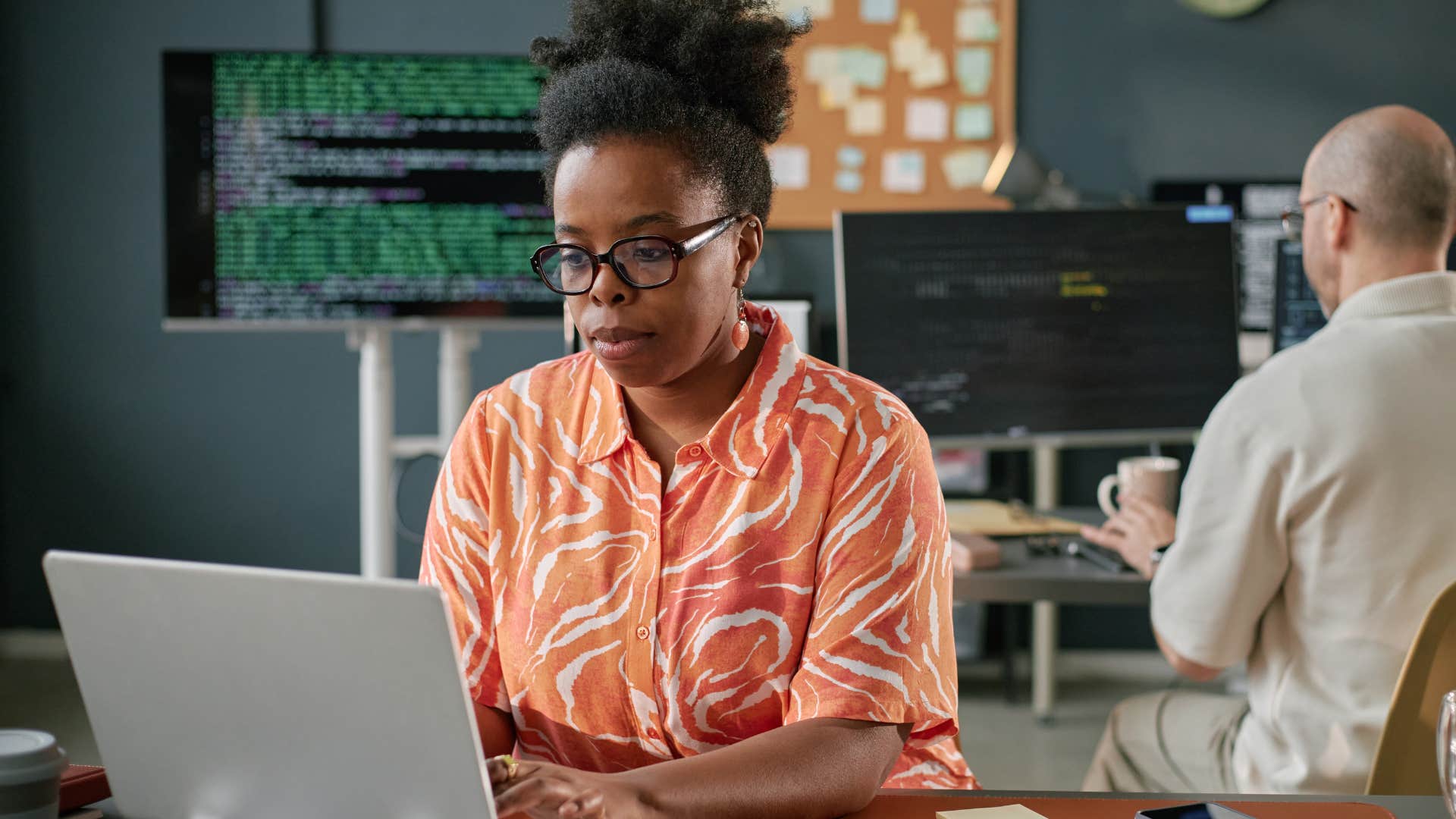 Independently competent woman working in an office.