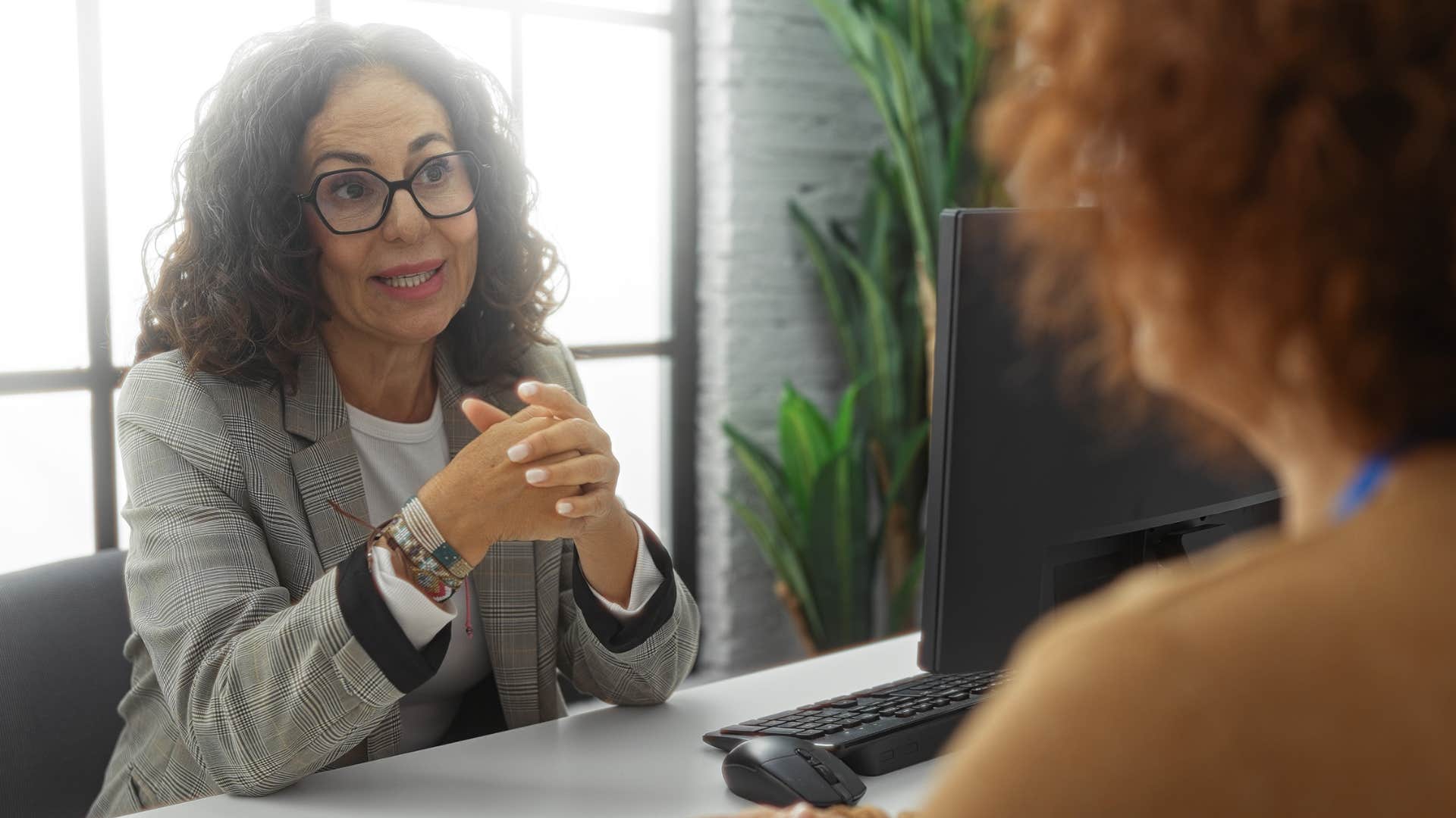 woman having conversations with differing opinions at work