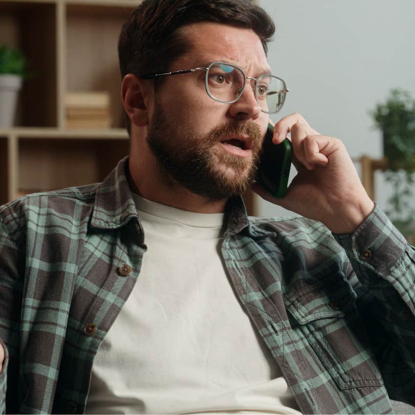 Man who believes everything needs an explanation arguing on the phone.