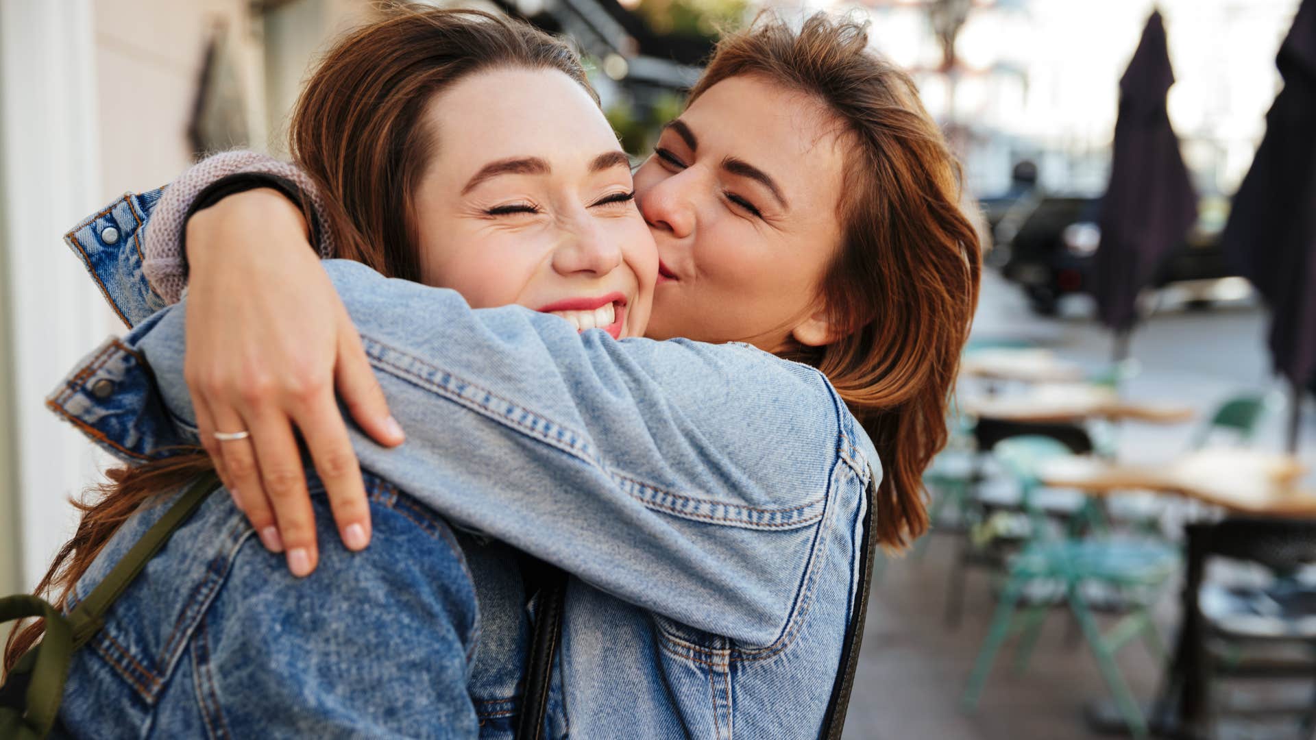 best friends hugging treating each other like family