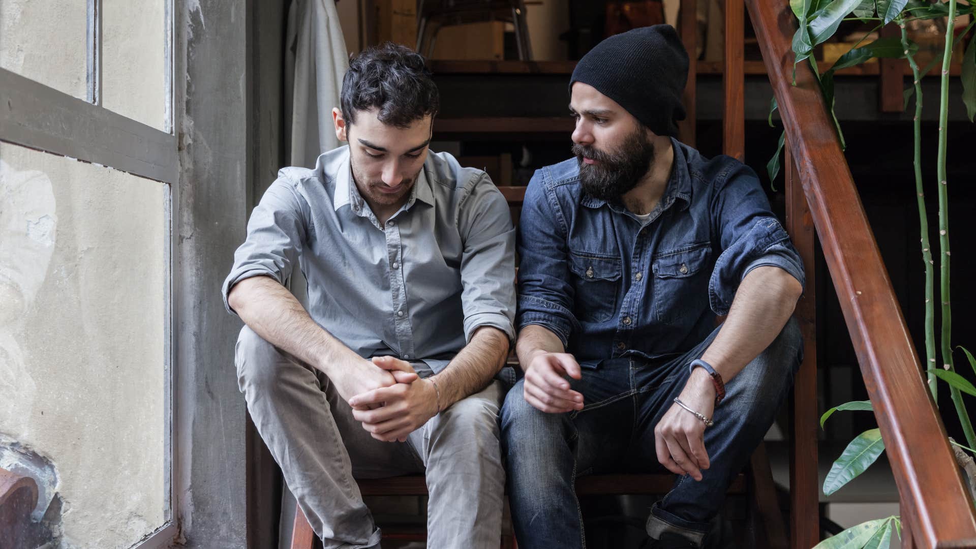 man talking to friend valuing depth over quantity