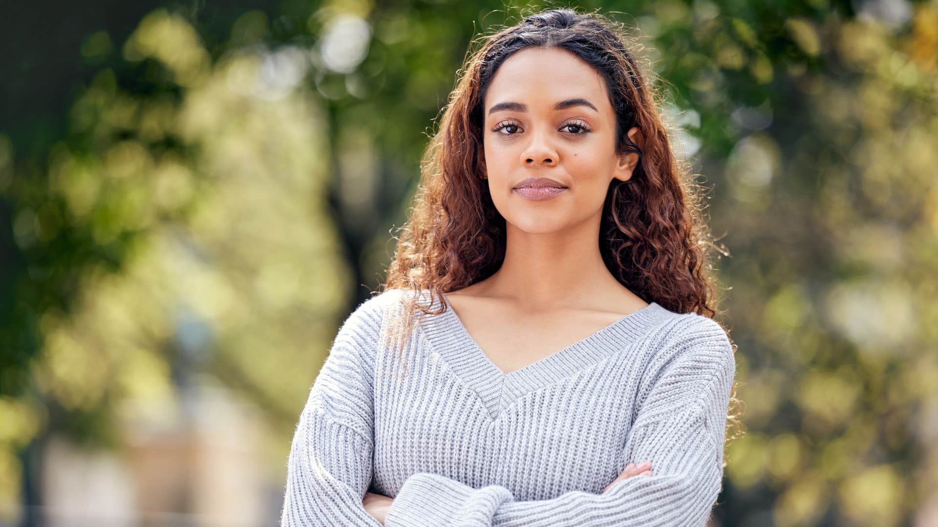 woman in gray sweater is an independent thinker