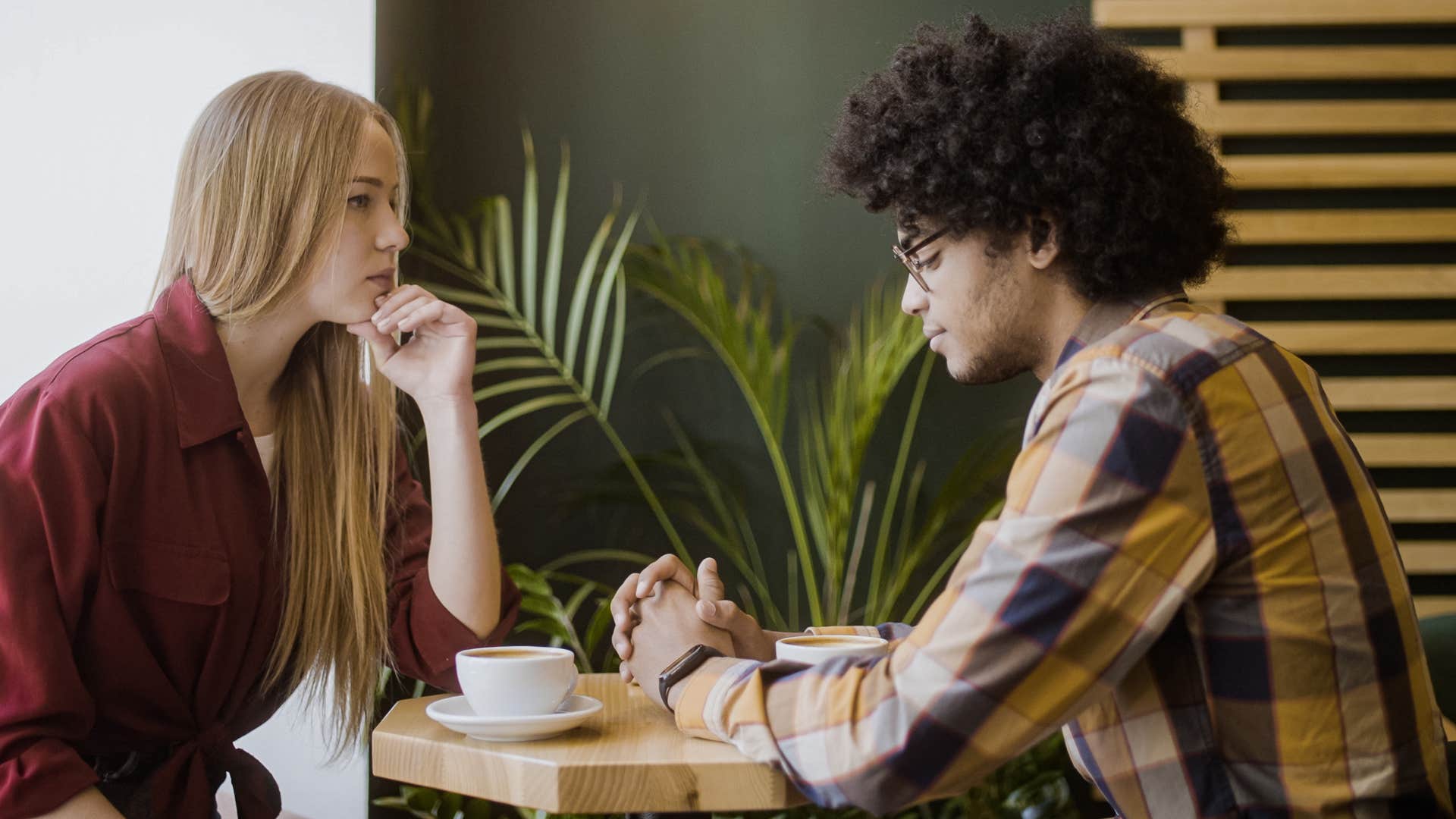 woman in red shirt can sense someone's fake intentions easily