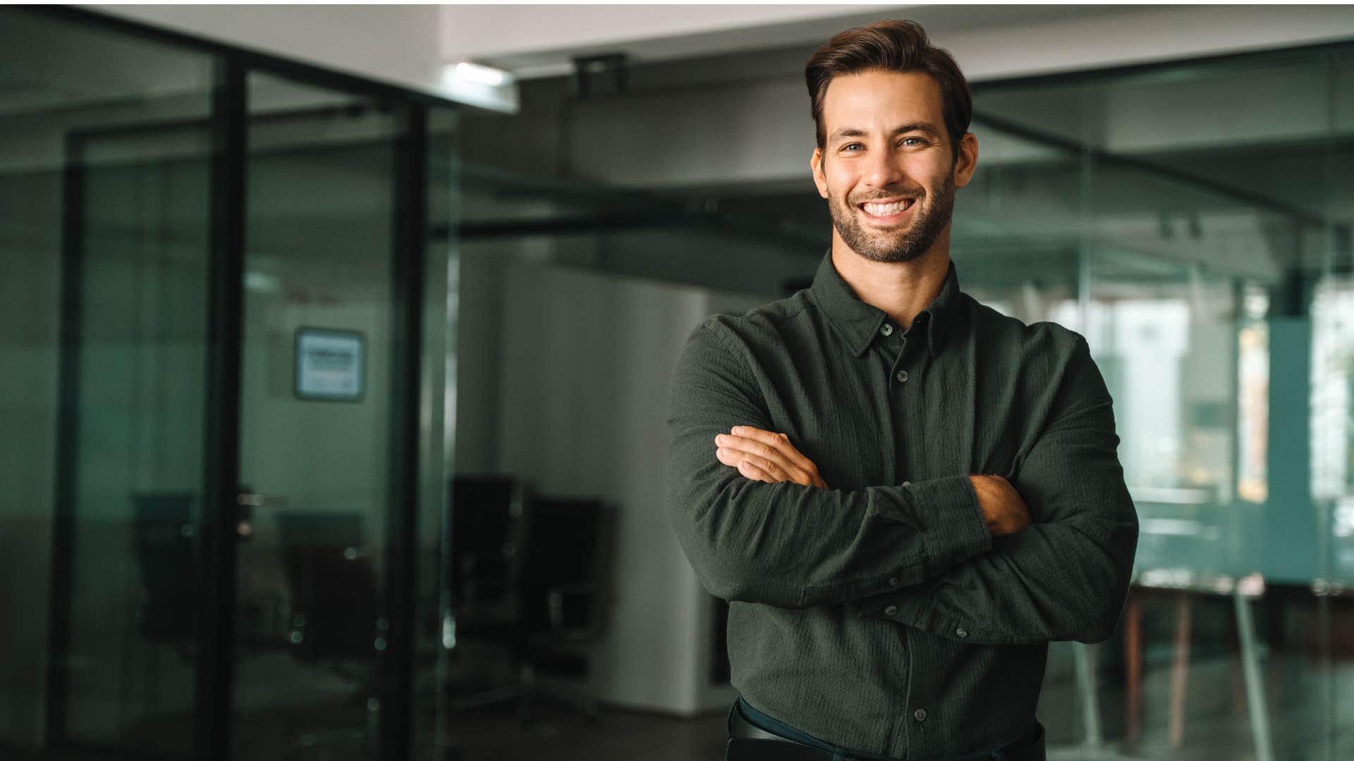 prideful man smirking at work