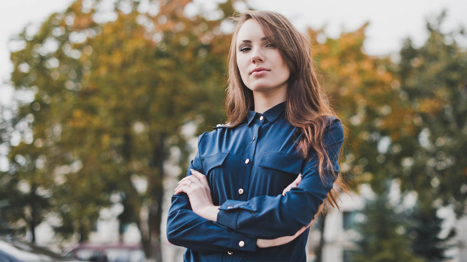 highly self sufficient woman standing outside