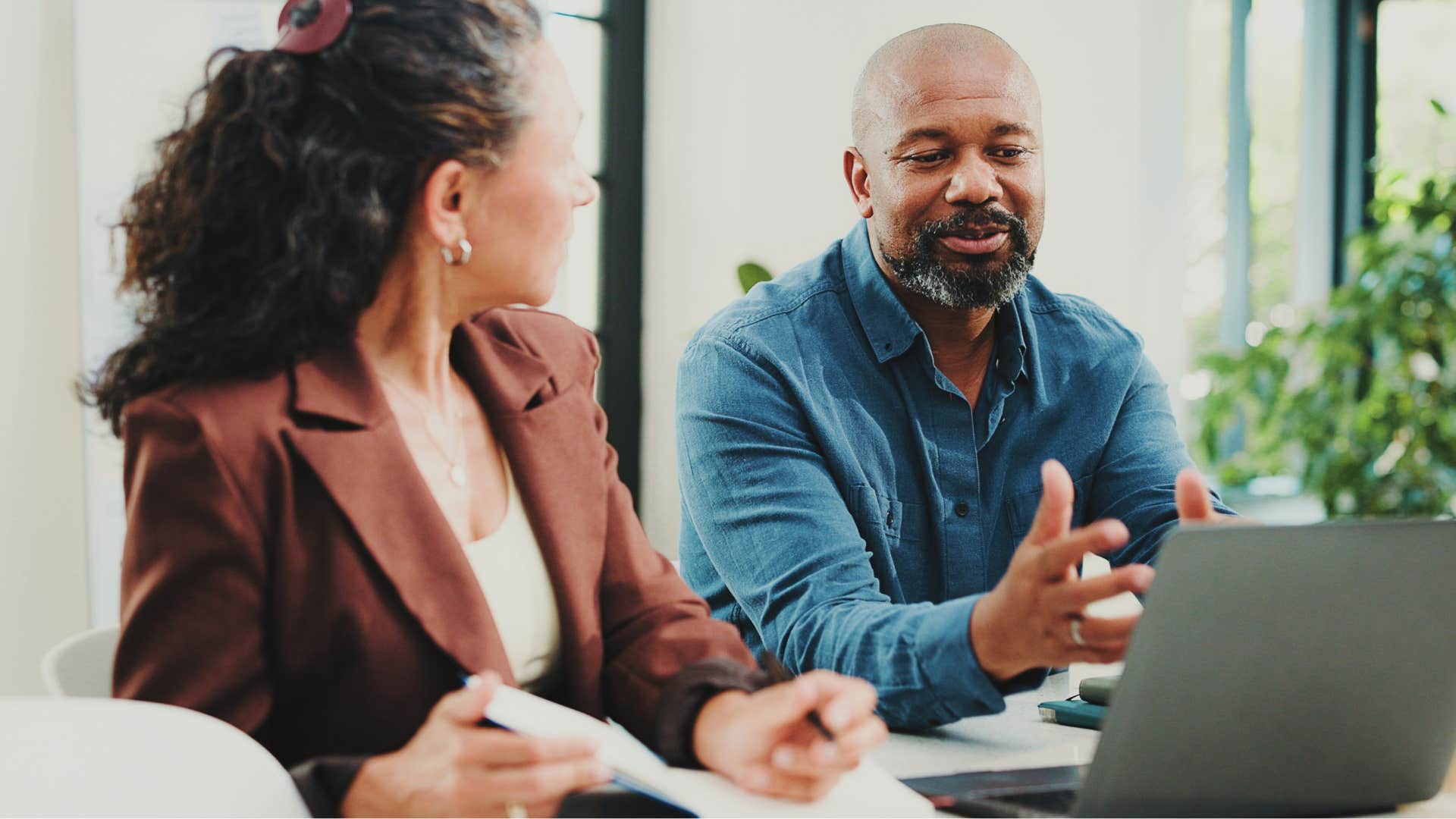 older colleagues talk about project showing hard work is the simple solution