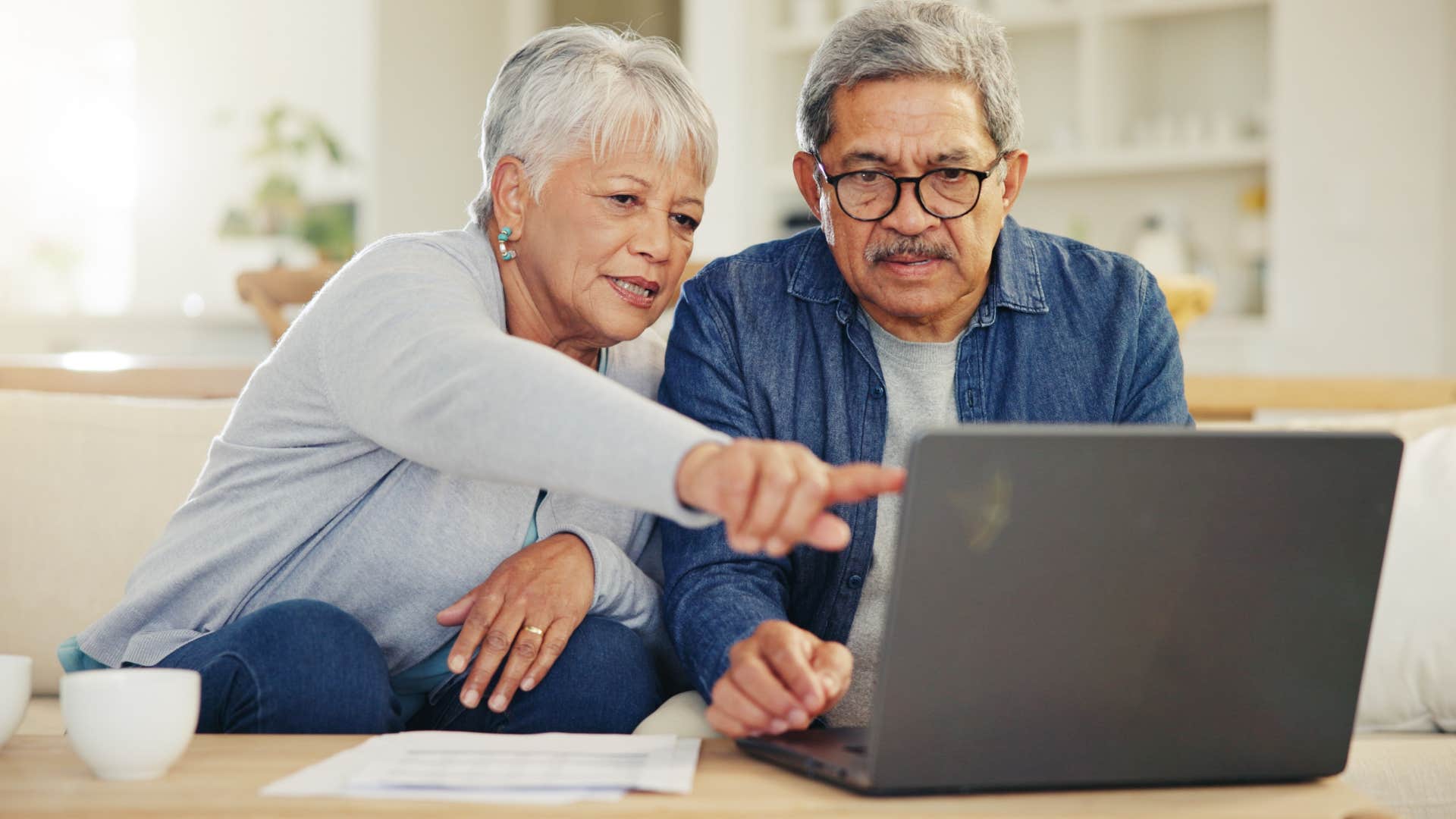 happy older couple make plan showing no fear