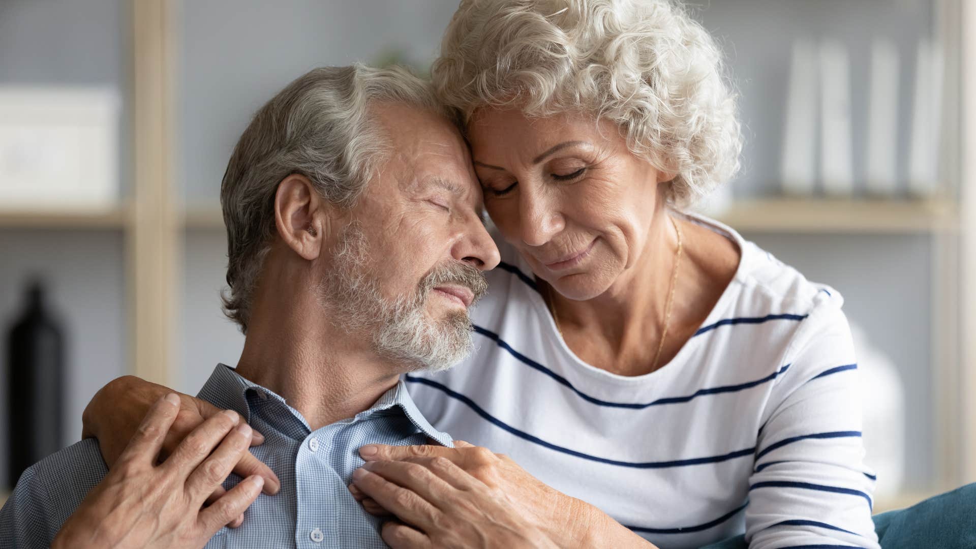 loving older couple embrace showing good marriage