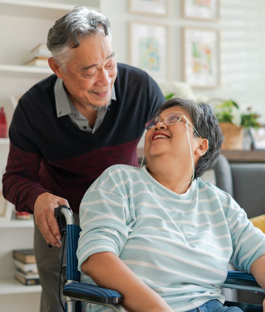 happy older people help each other