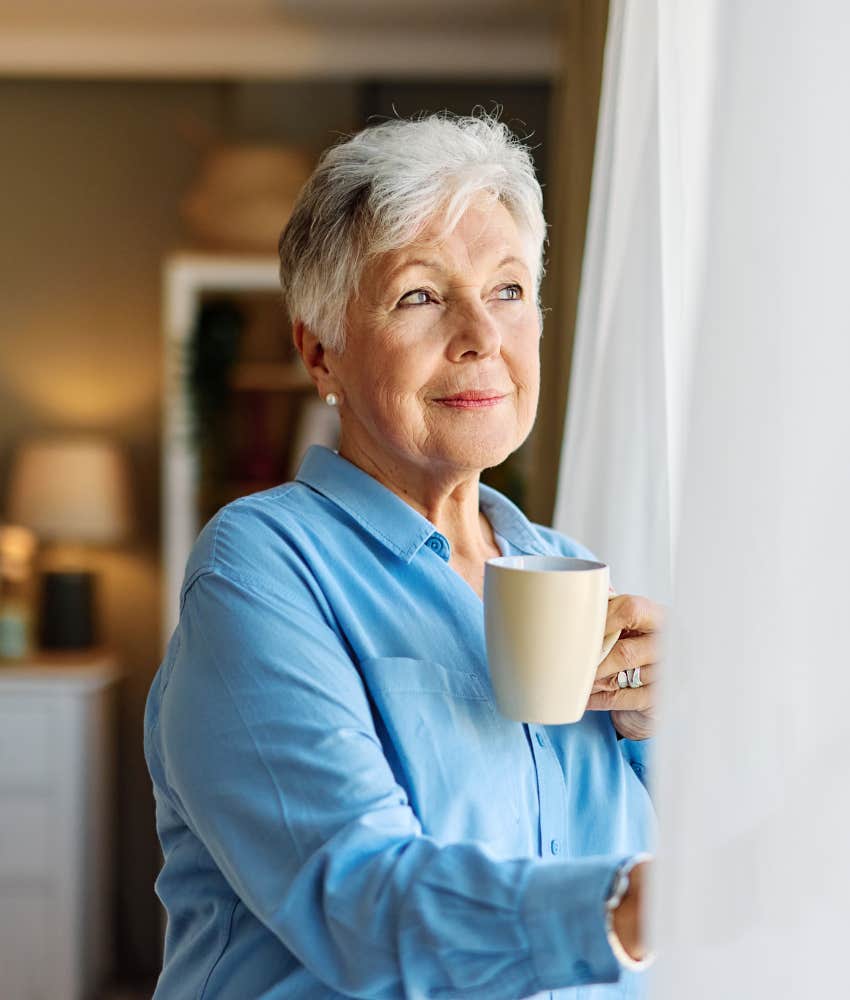 calm older person looks out window showing they don't resist