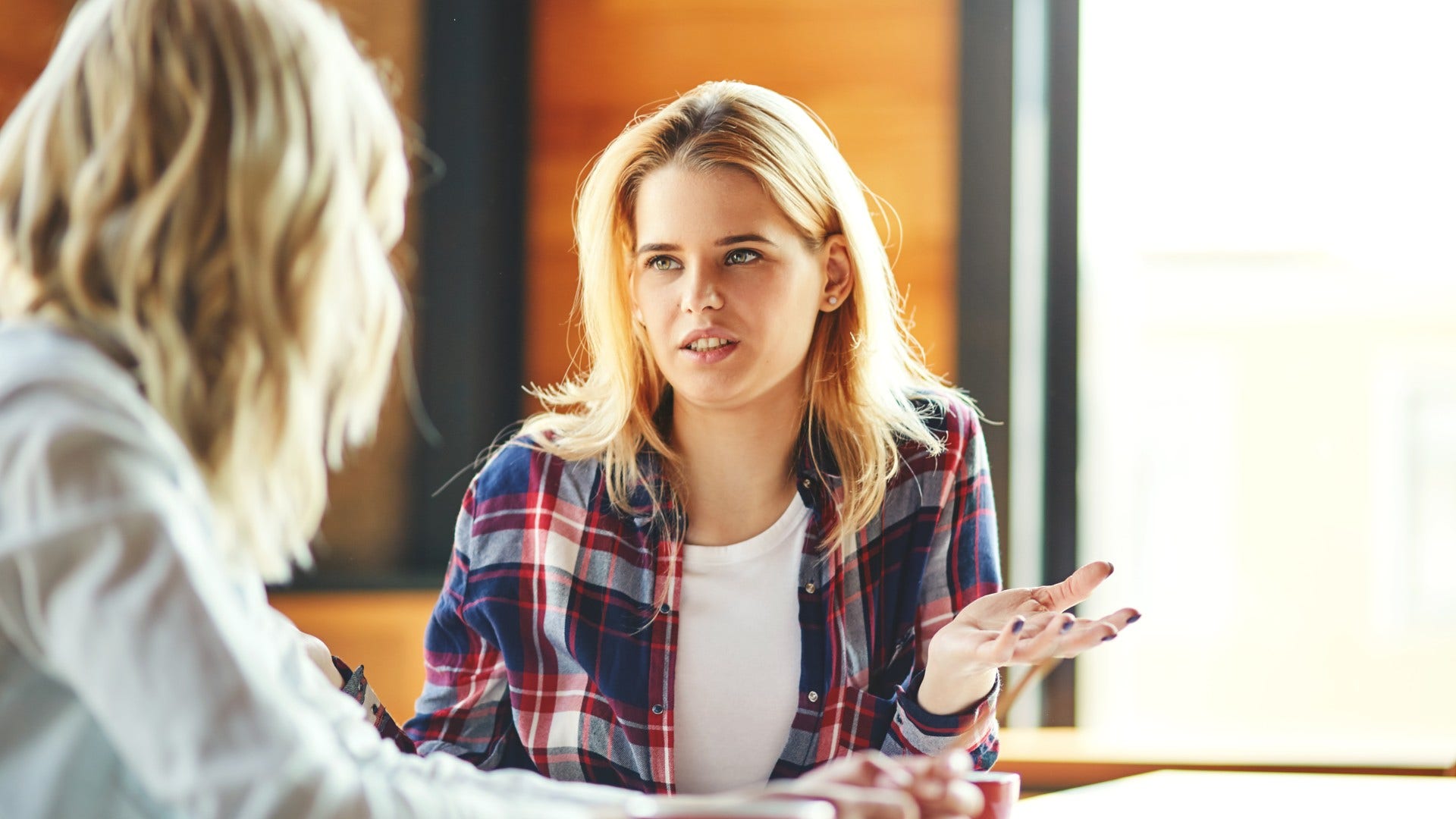 woman who can see both sides of the argument listening more than talking