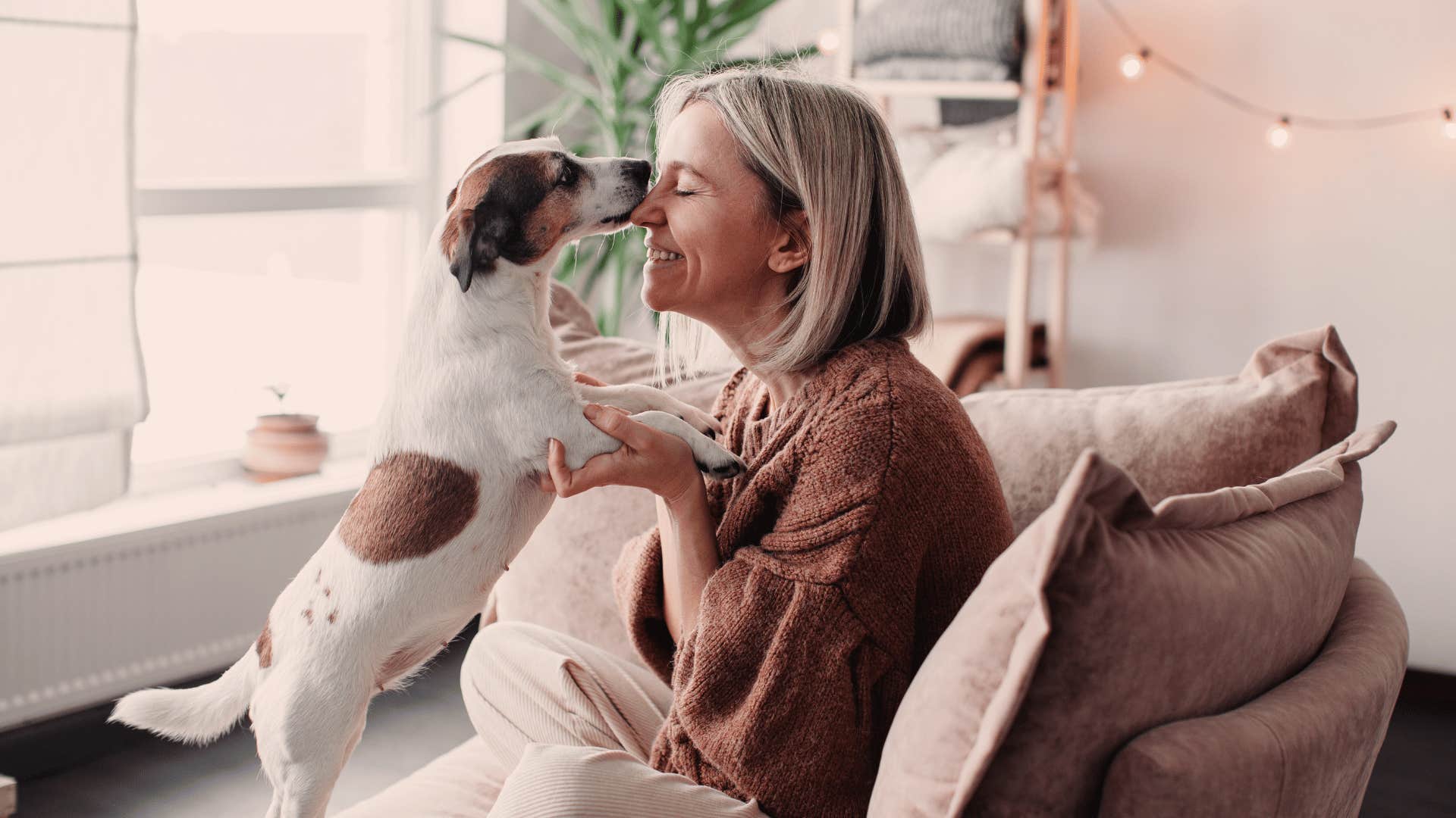 woman who sleeps with pet in her bed and builds routines around pets