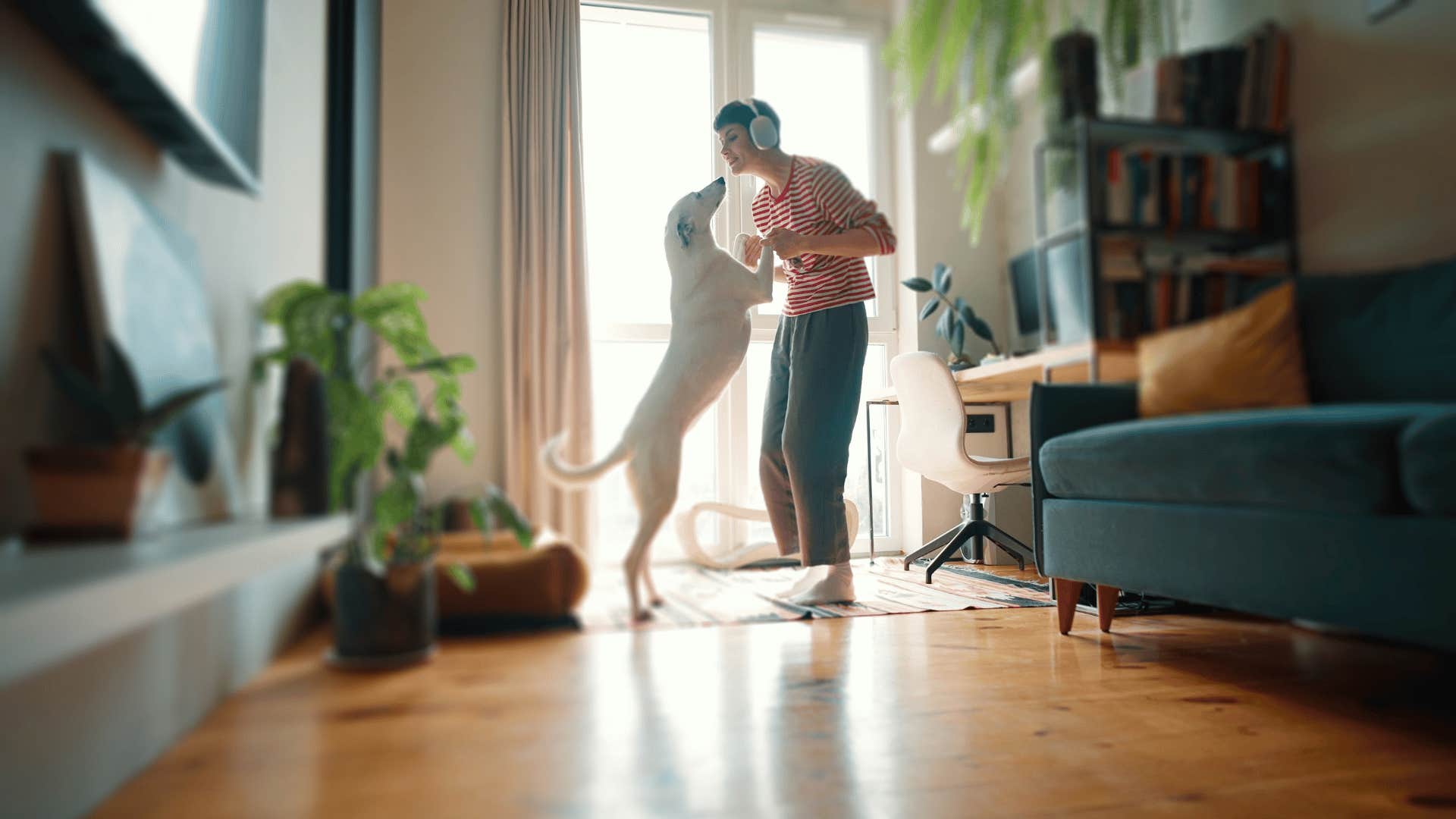 woman who sleeps with pet in her bed and enjoys small cozy rituals