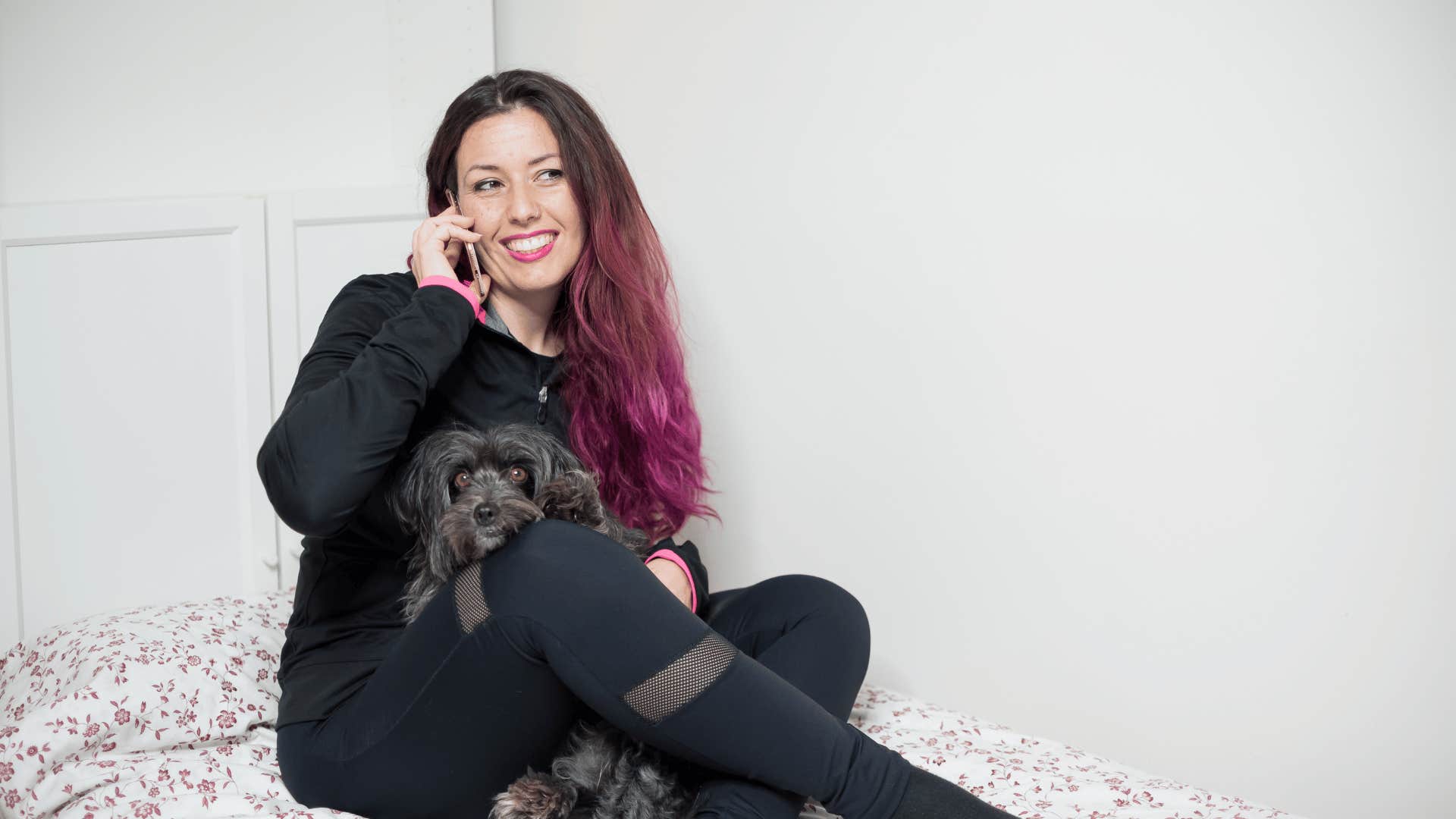 woman who sleeps with pet in her bed and finds comfort in closeness