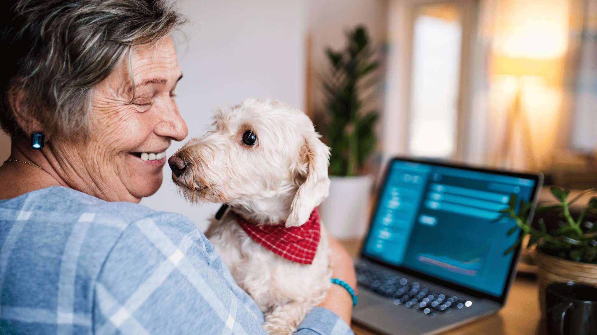woman who sleeps with pet in her bed and has favorite sleeping positions