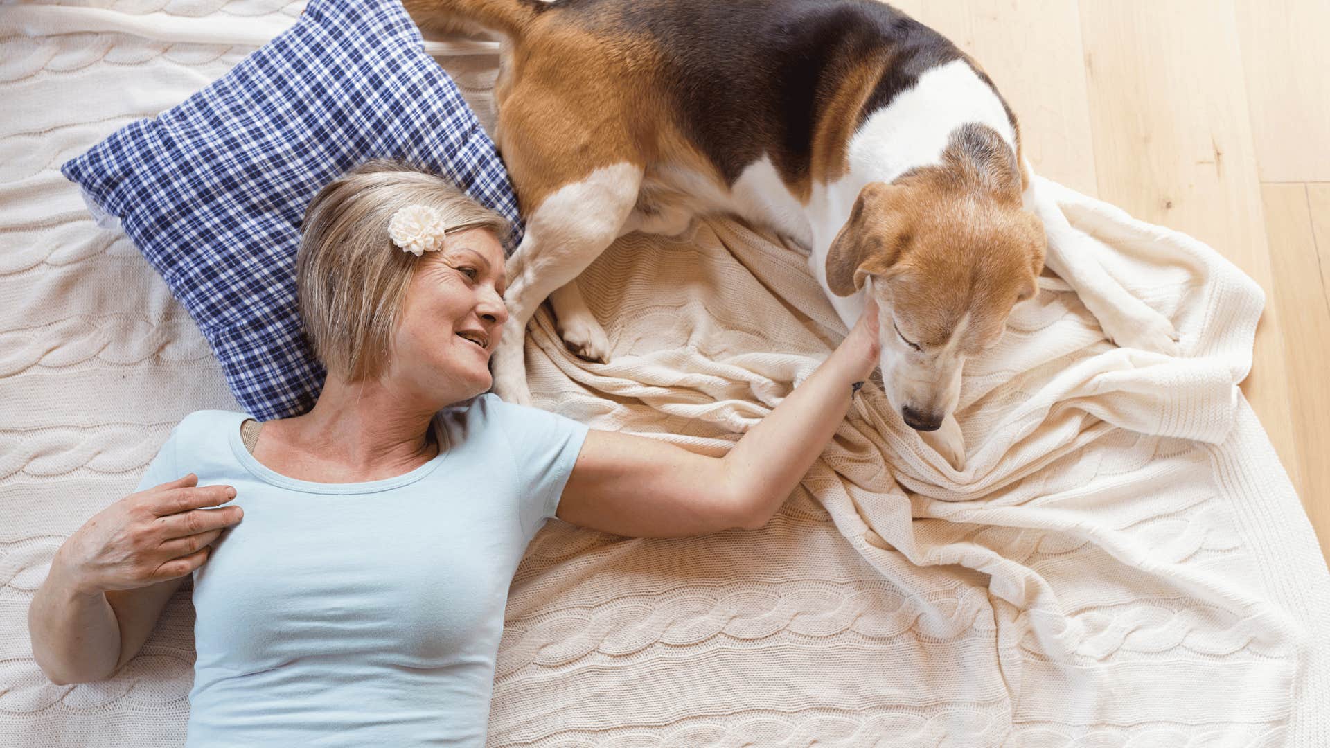 woman who sleeps with pet in bed and sees pet as a family member