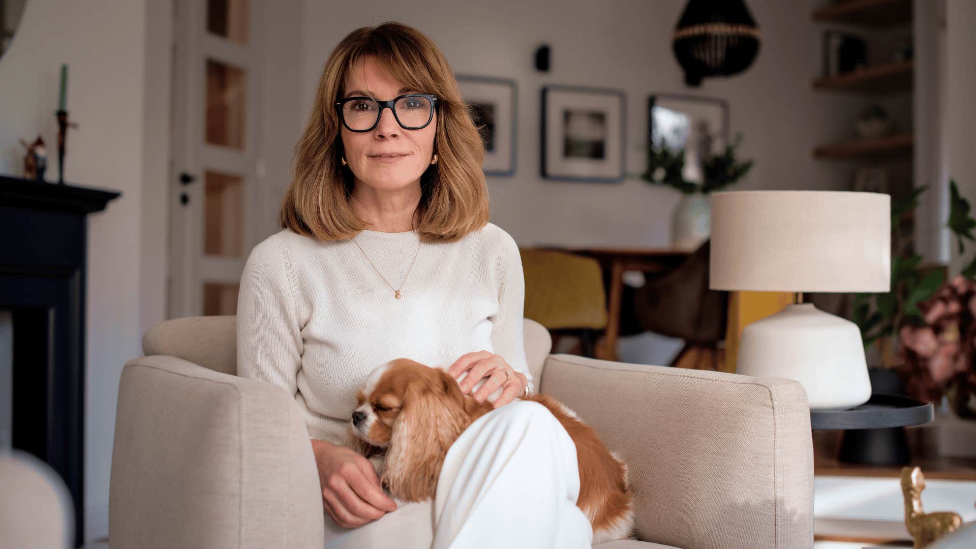 woman who sleeps with pet in her bed and talks to her pet like a member of her household