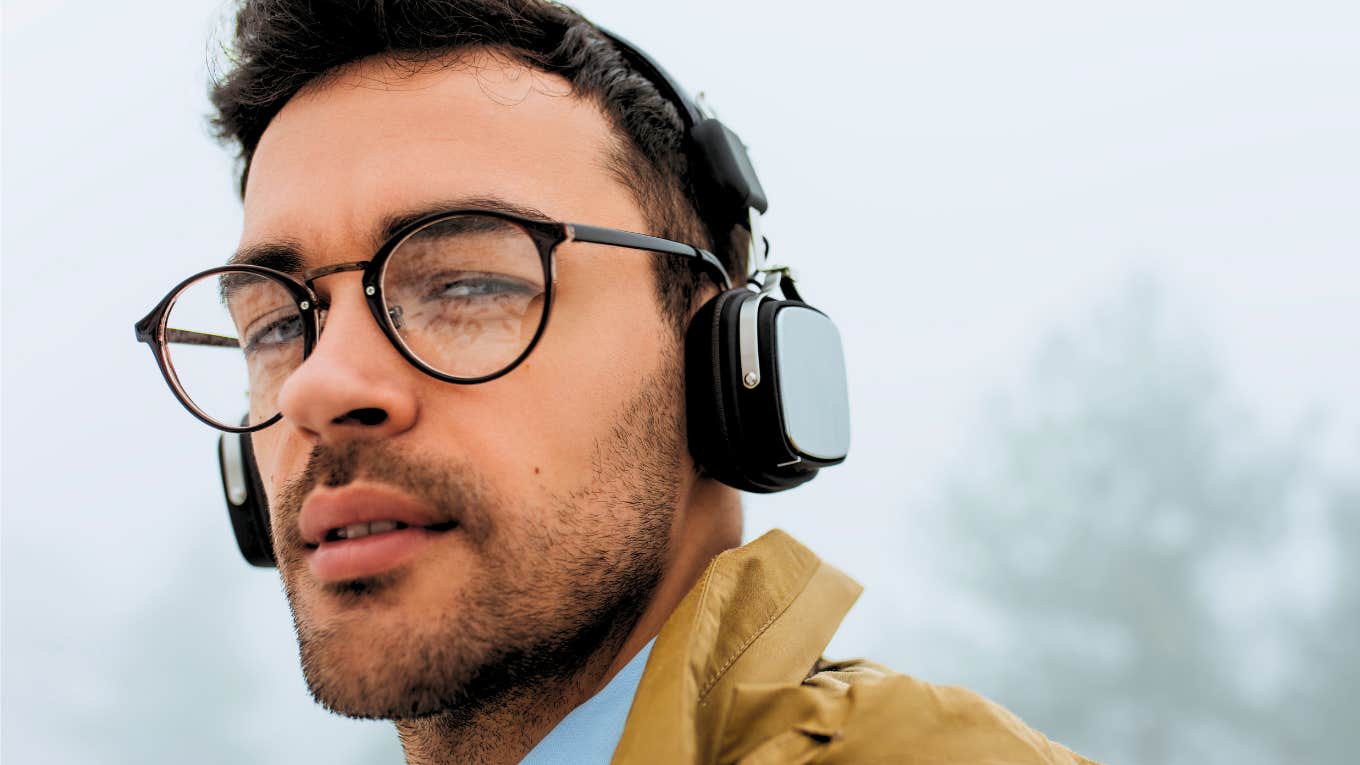 man wearing headphones listening to the same music he loved in his 20s