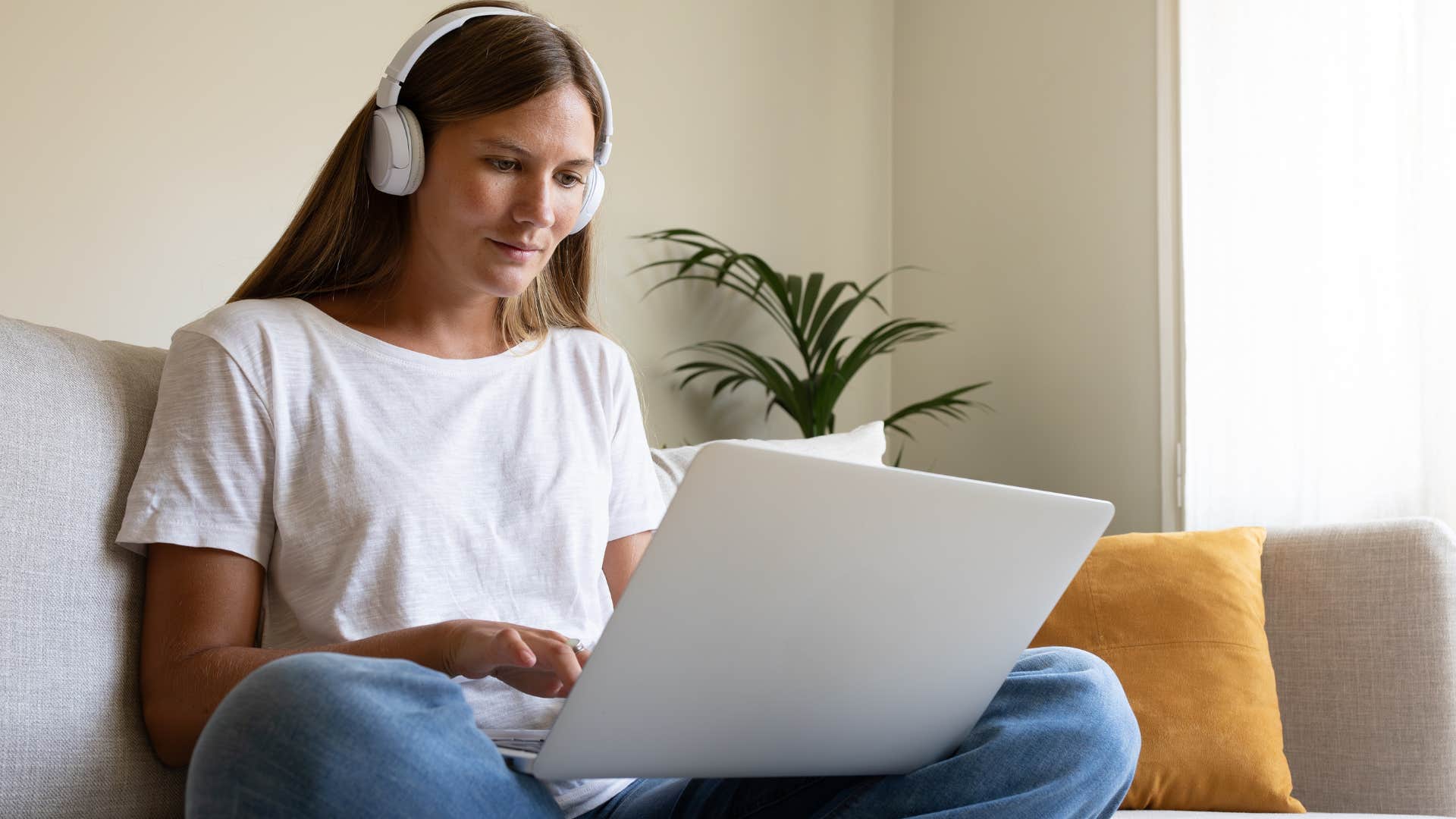 woman sitting cross legged needing to feel grounded while working