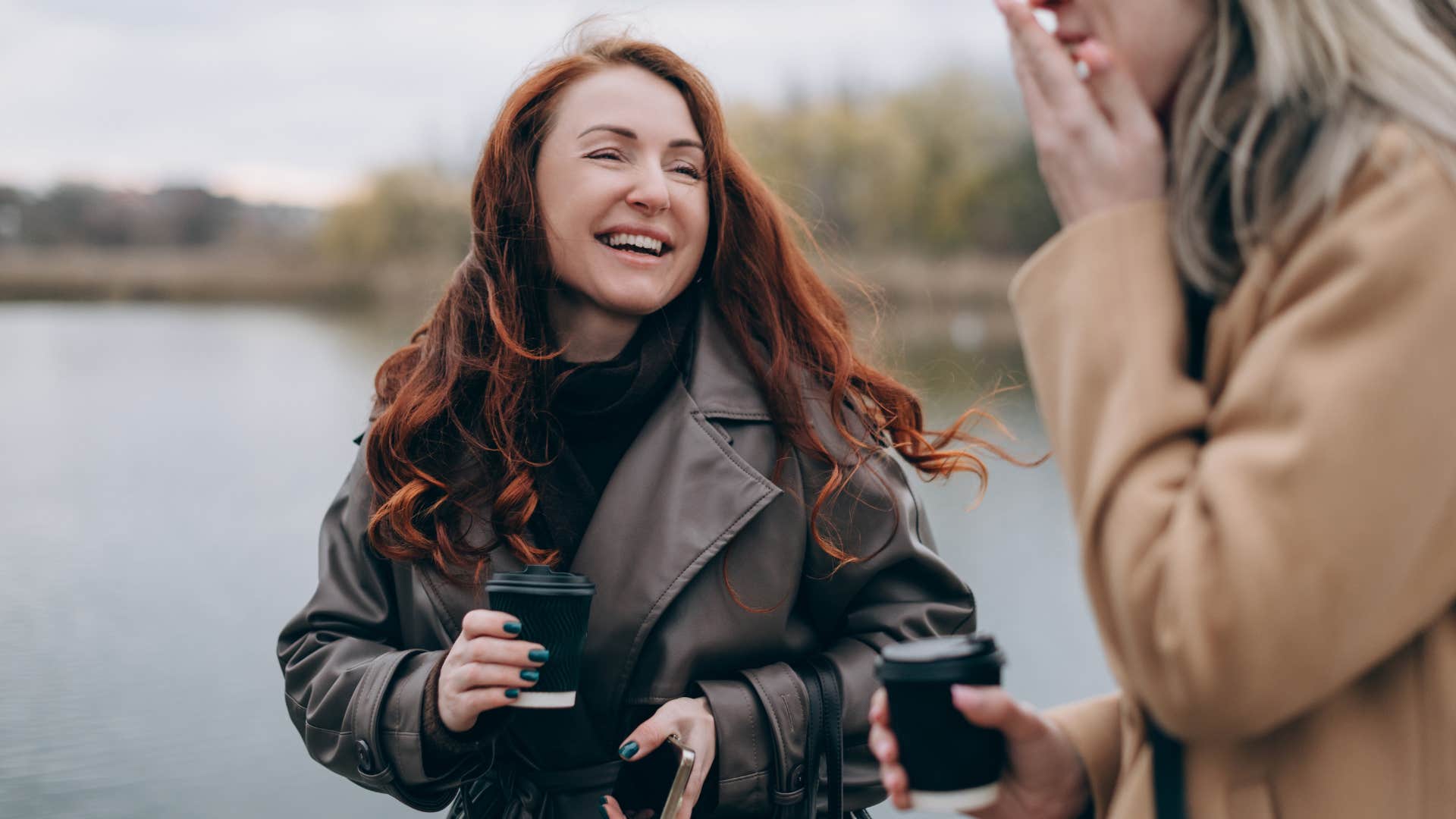socially awkward woman who remembers names and details smiling with a friend