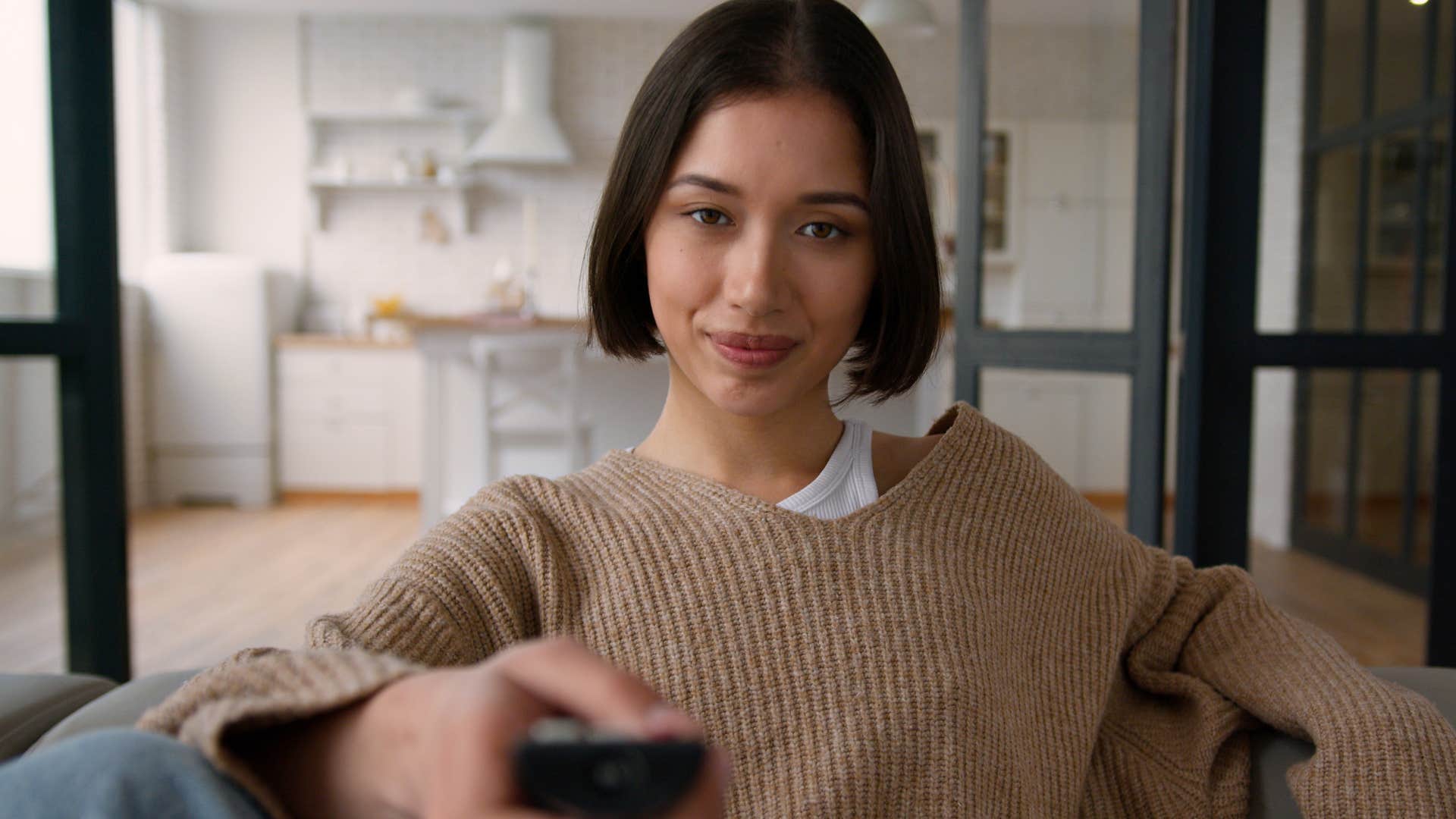 unusually intelligent woman watching jeopardy!