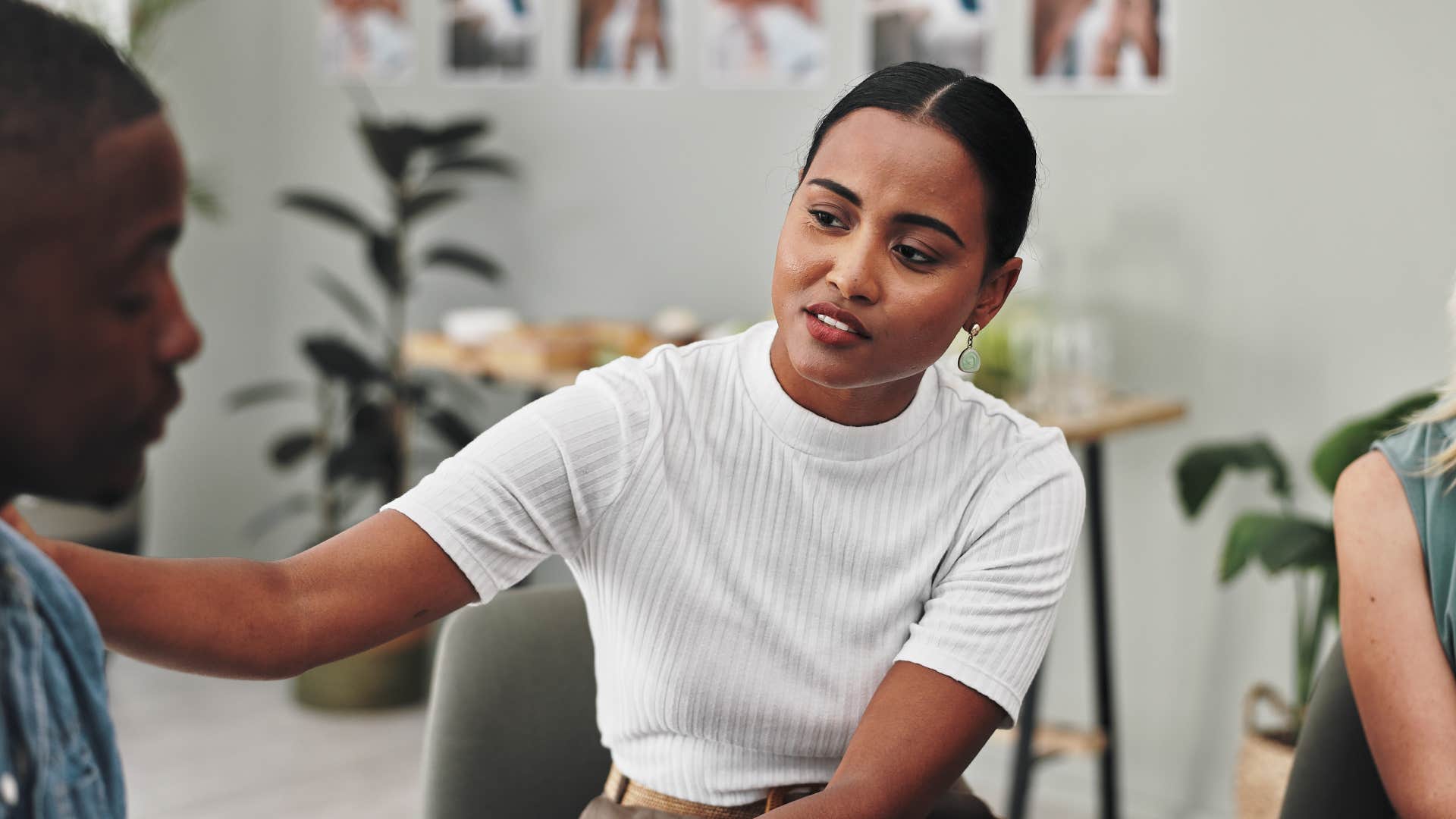 empathetic woman comforting friend