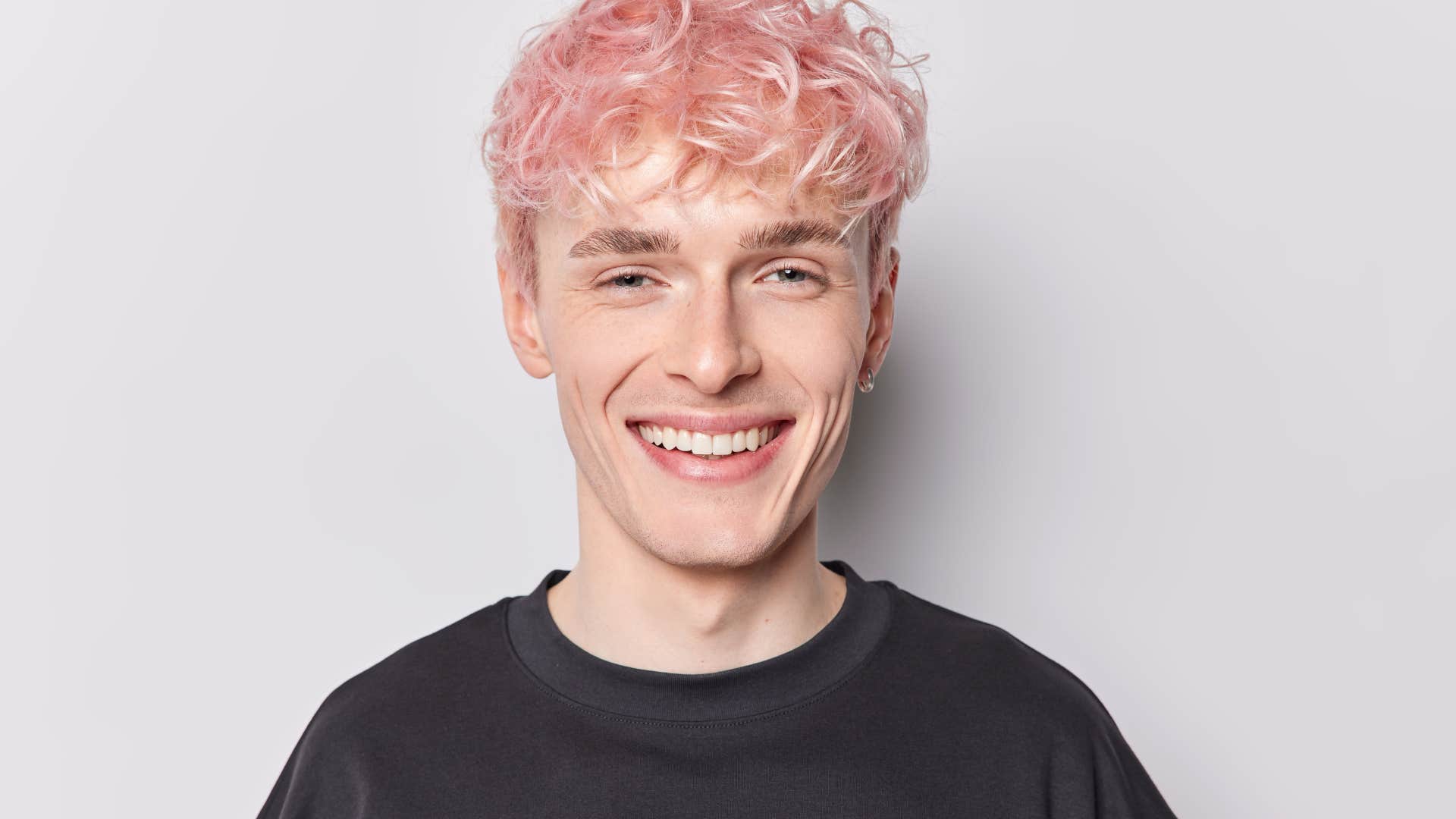 man with pink hair who likes to stand out