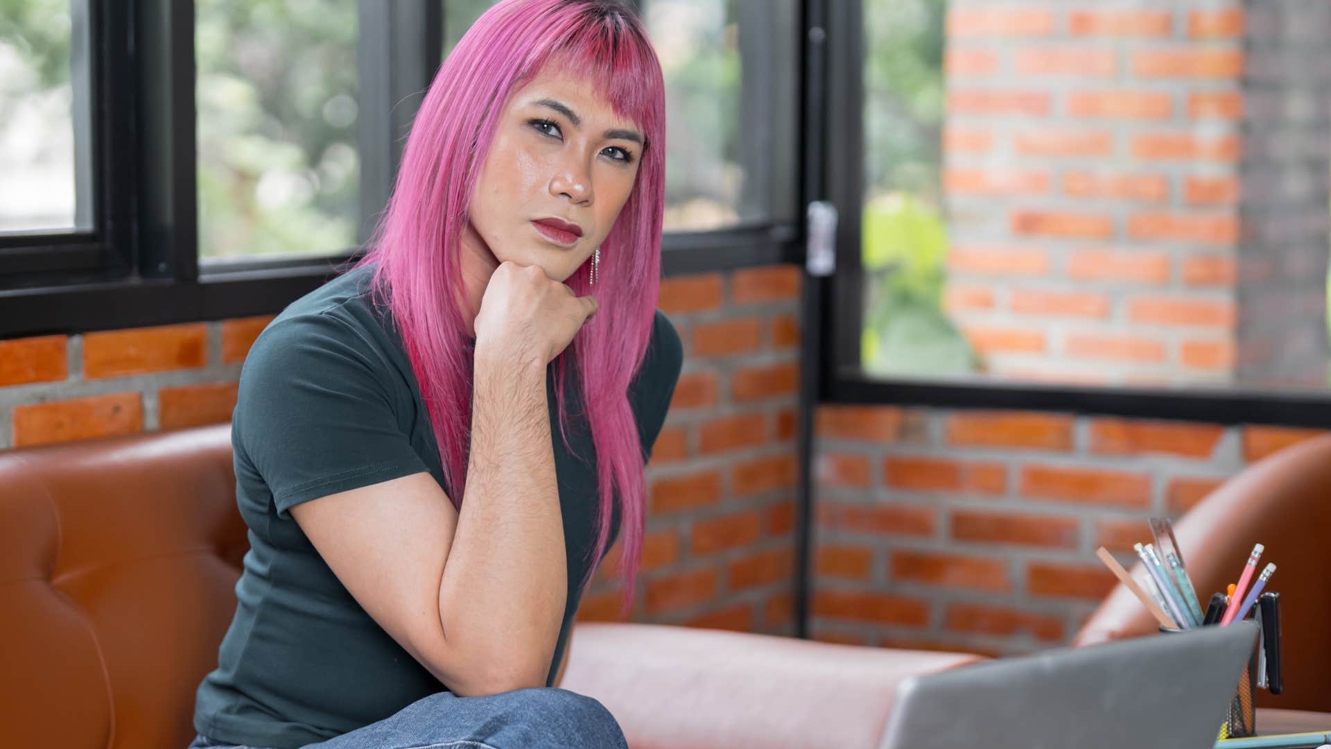 woman with fun hair color who's more creative than the average person