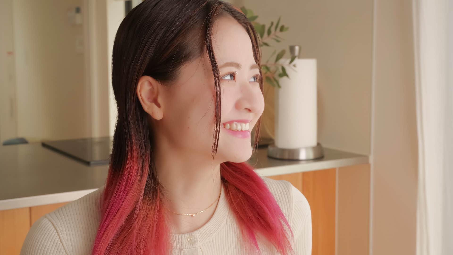 unconventional woman with fun hair color smiling