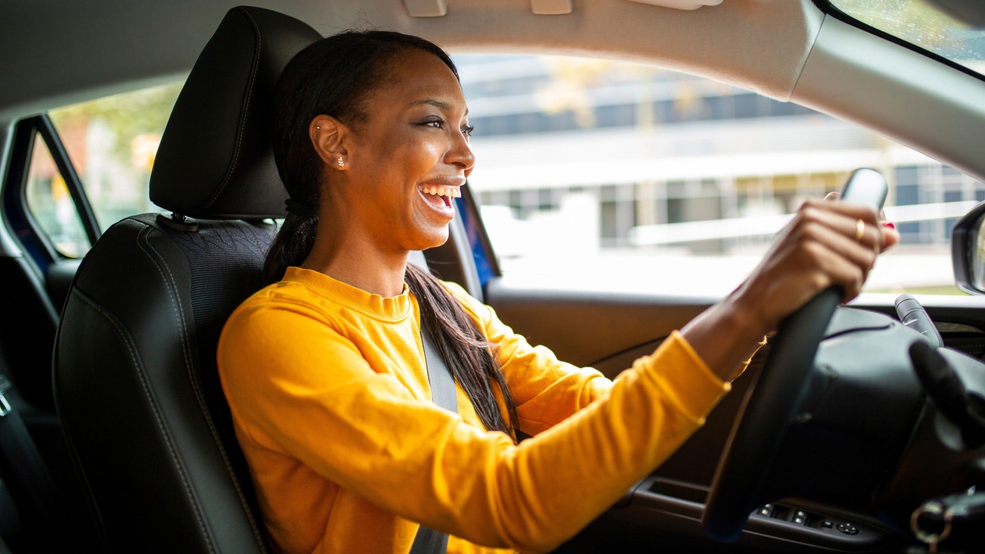 woman who enjoys drives with no destination as she doesn't need constant stimulation