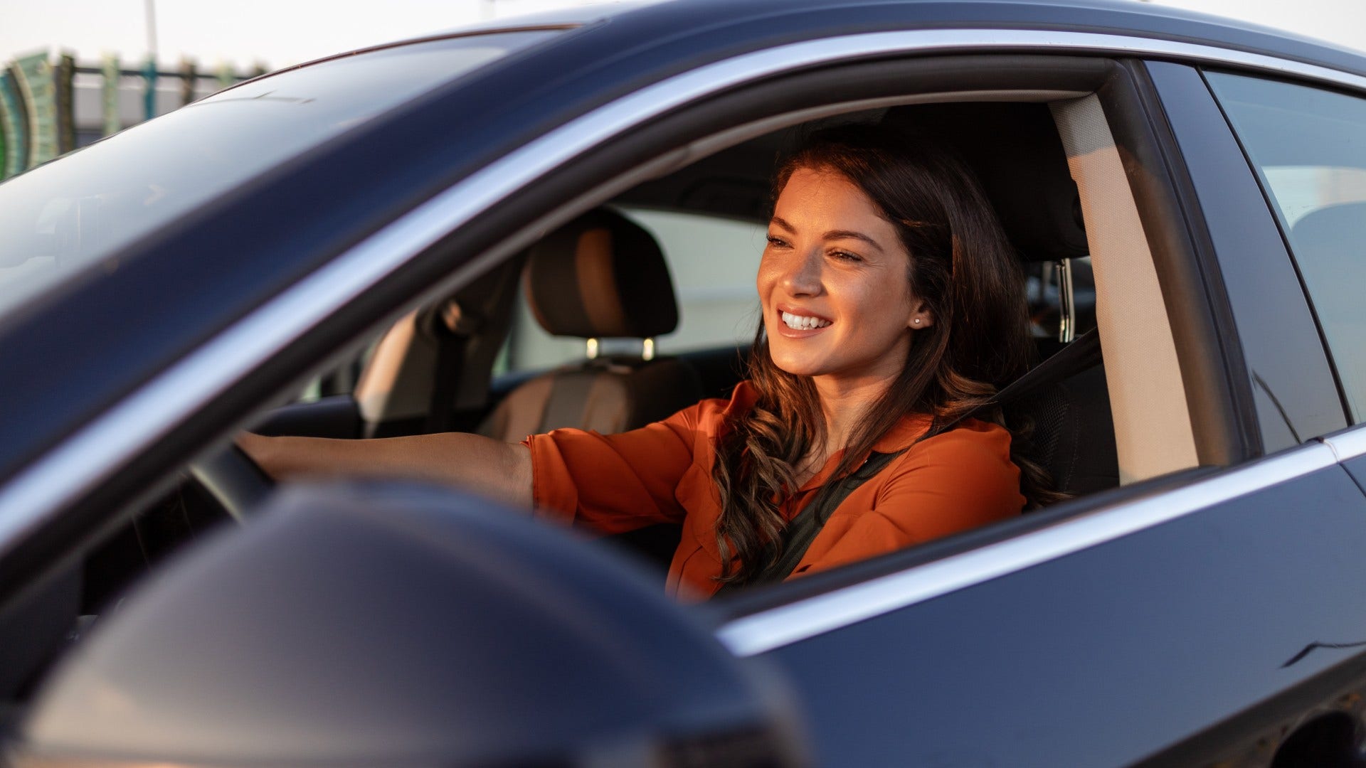 woman who enjoys drives with no destination as she values experiences that feel simple