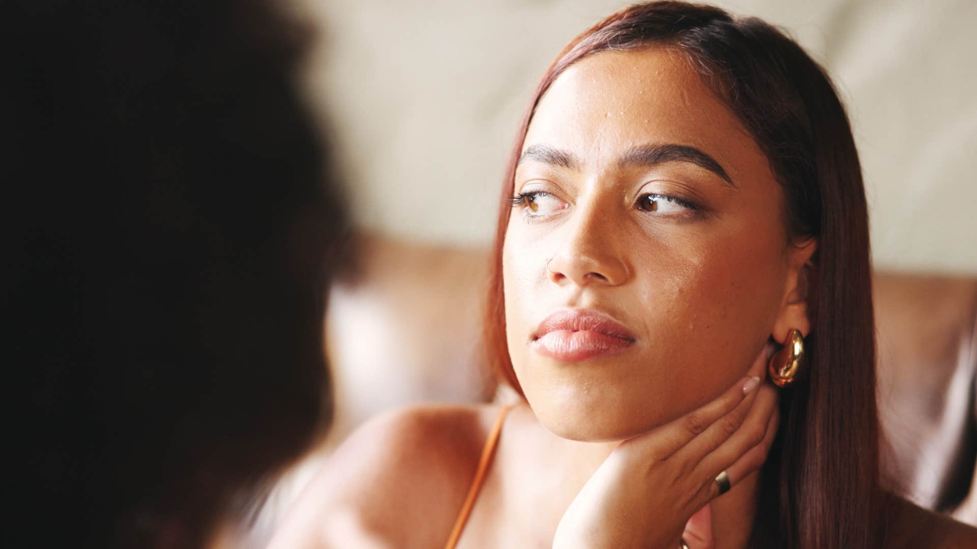 easily bored woman feeling like an outsider in conversation