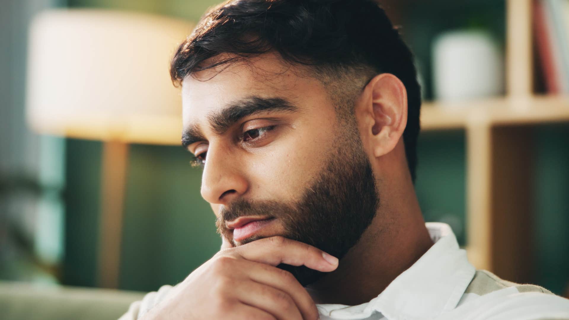 man who is easily bored appreciating newness and challenges while thinking