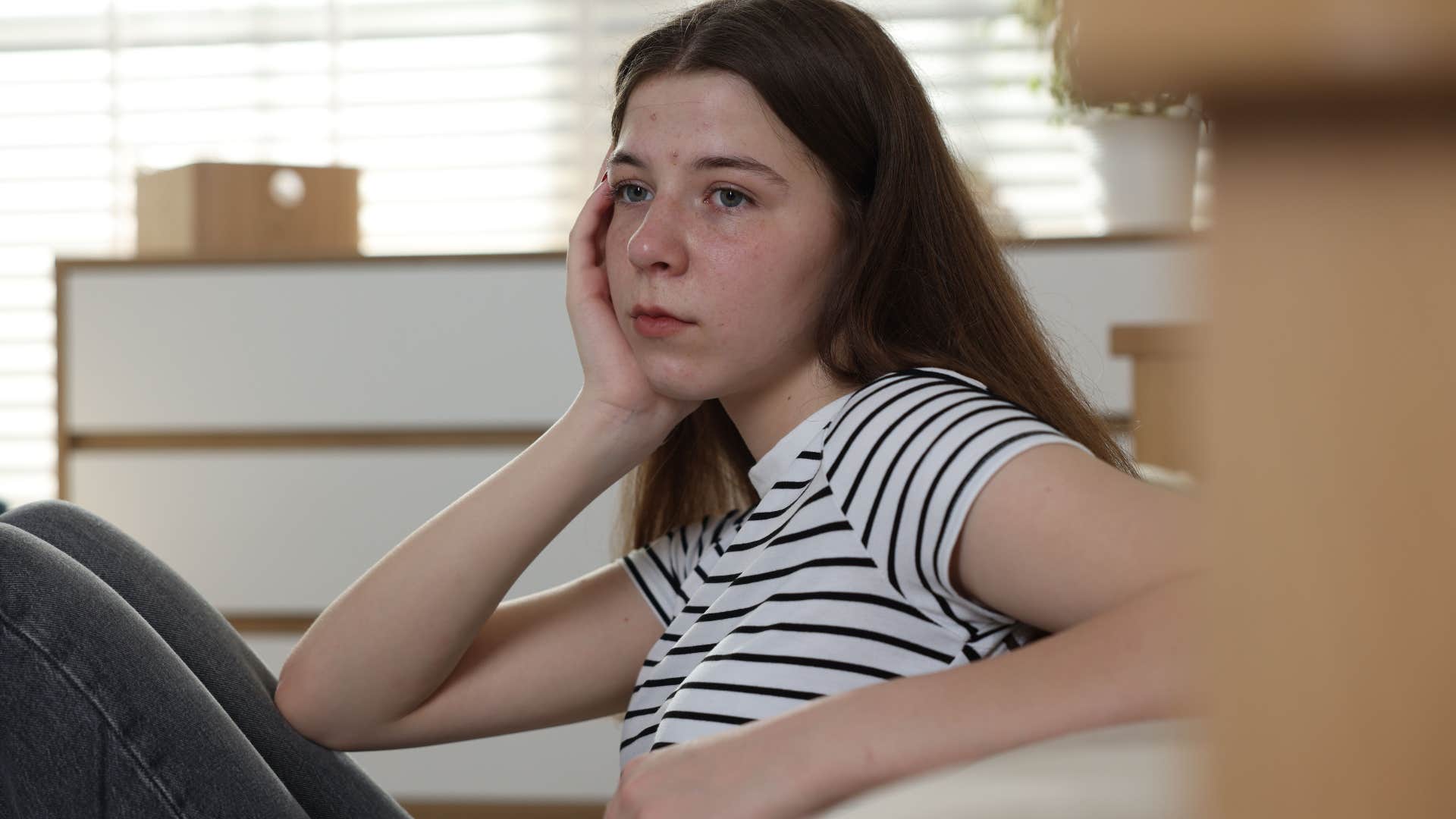 upset teenage girl feeling sensitive to judgment