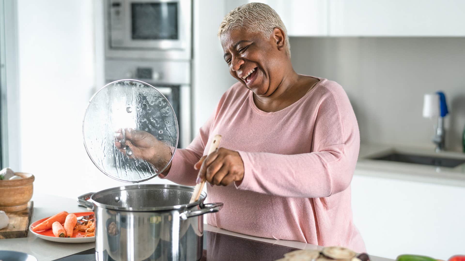 Happy older person cooks showing belief in self