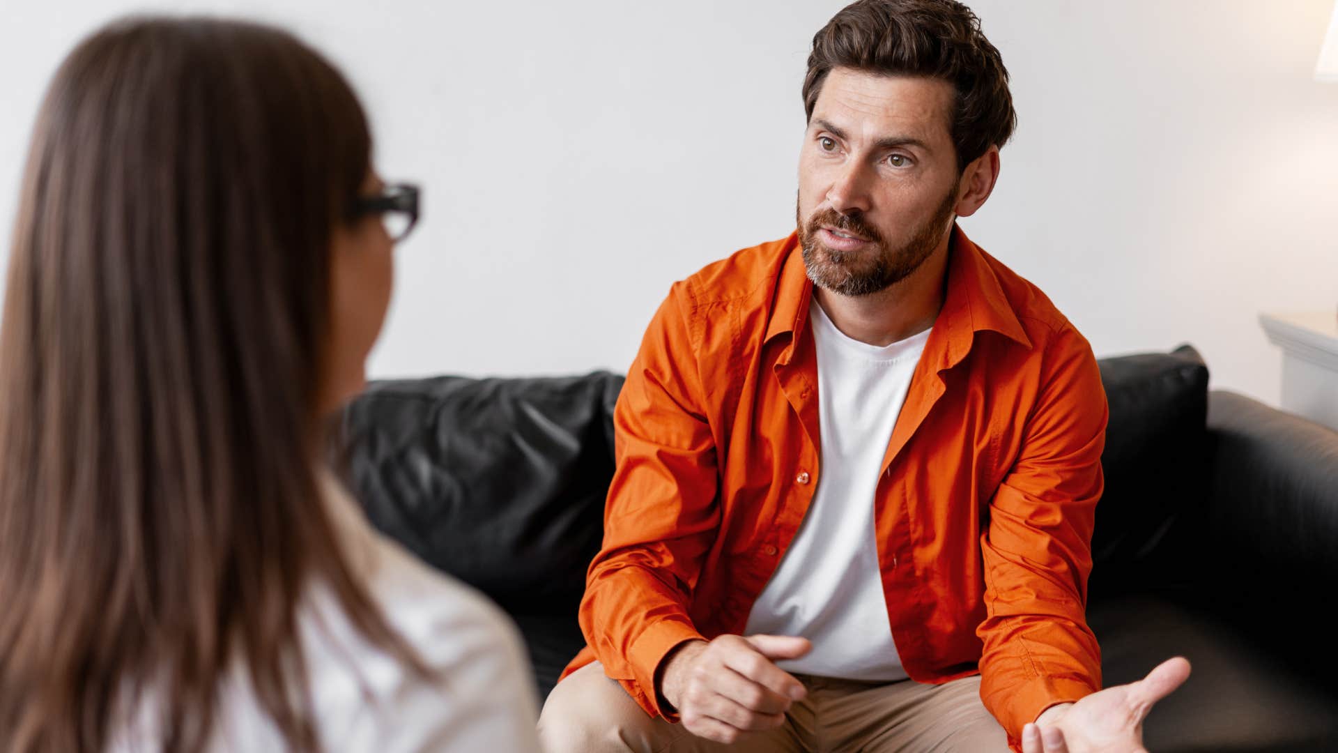 privileged and upset man saying I deserve it to woman